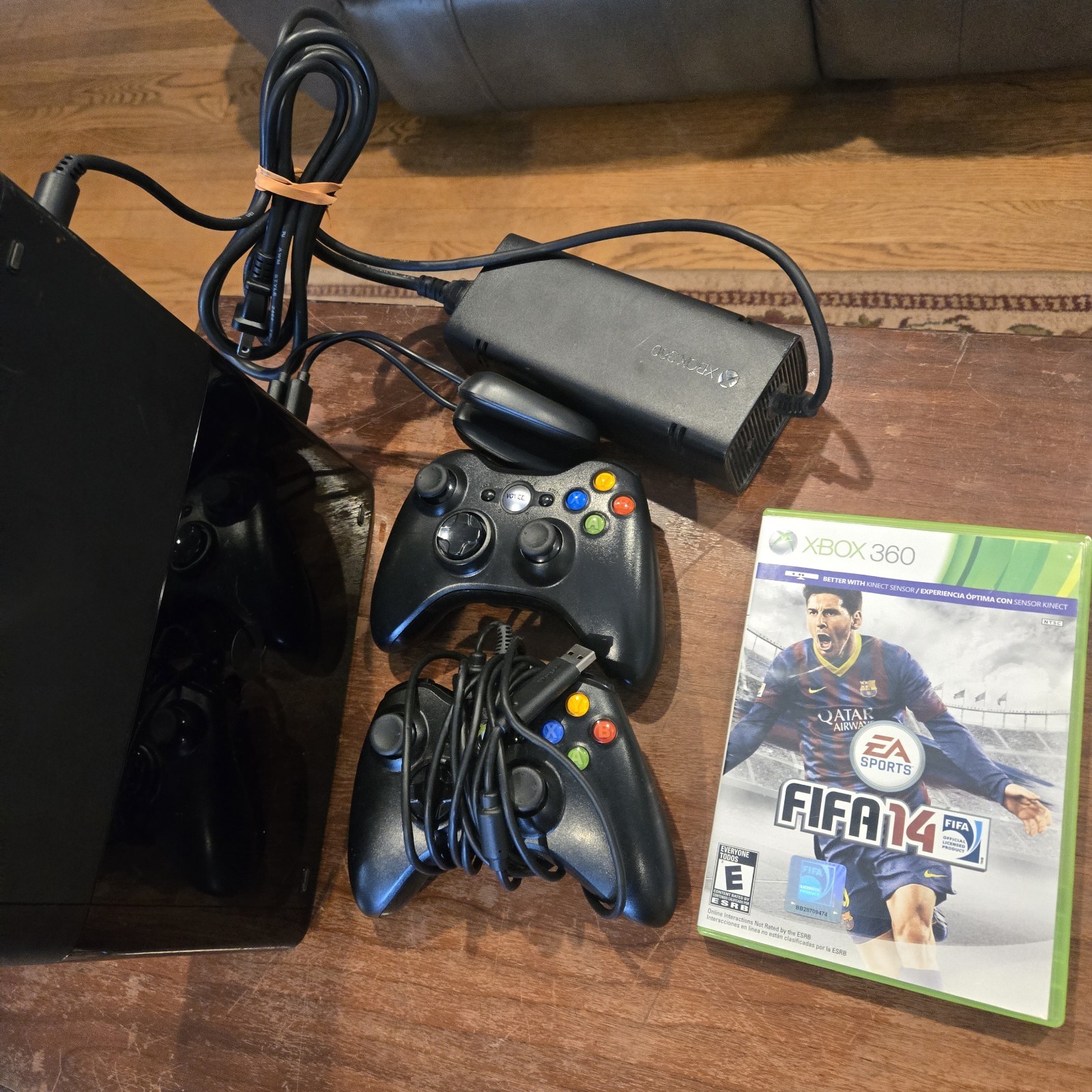 Microsoft Xbox 360 E 250GB Black Console w/2 Controllers, PSU, FIFA 14.