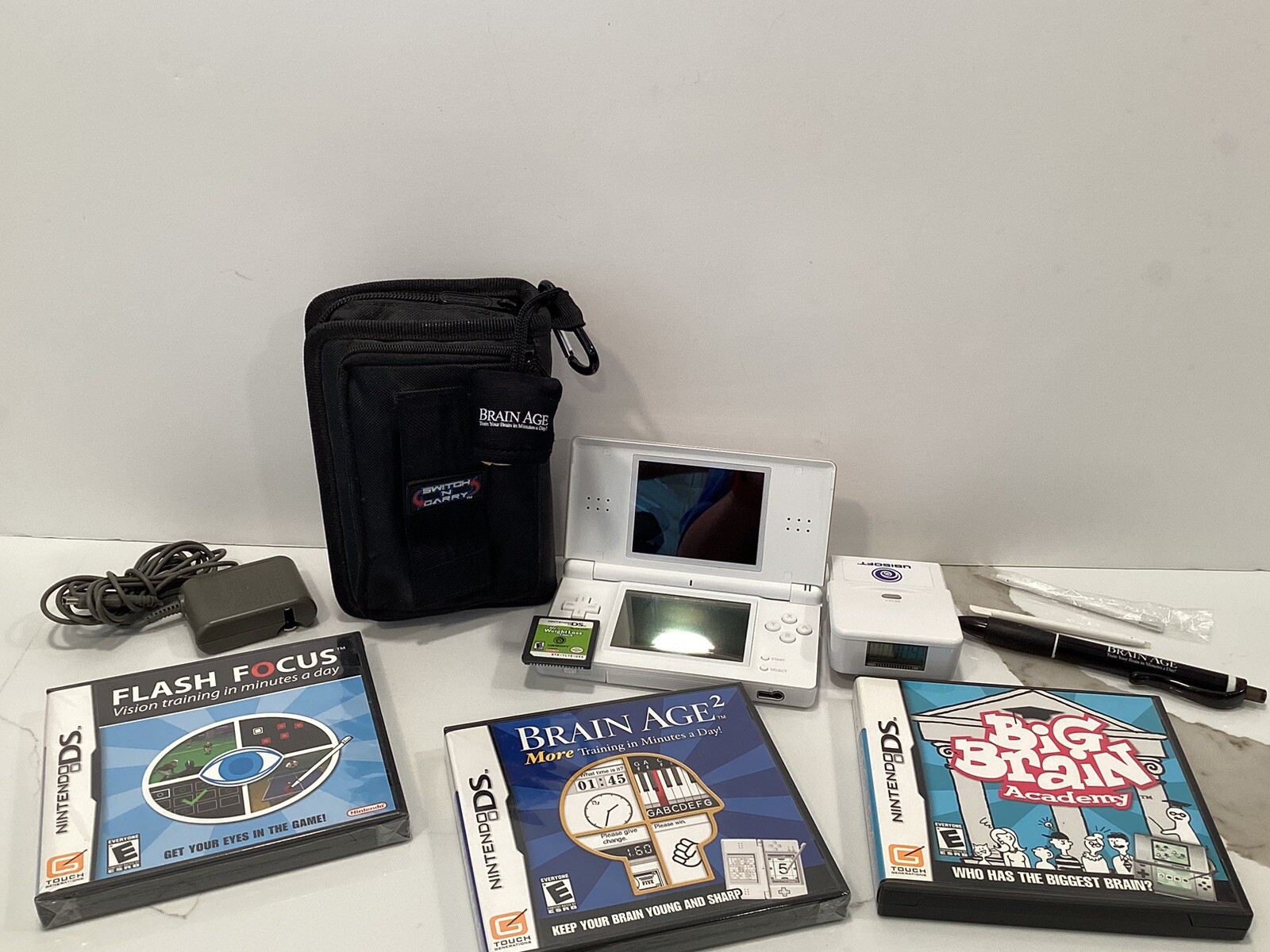 Nintendo DS Lite Polar White some light scratches, 2 styluses, & charger + Games
