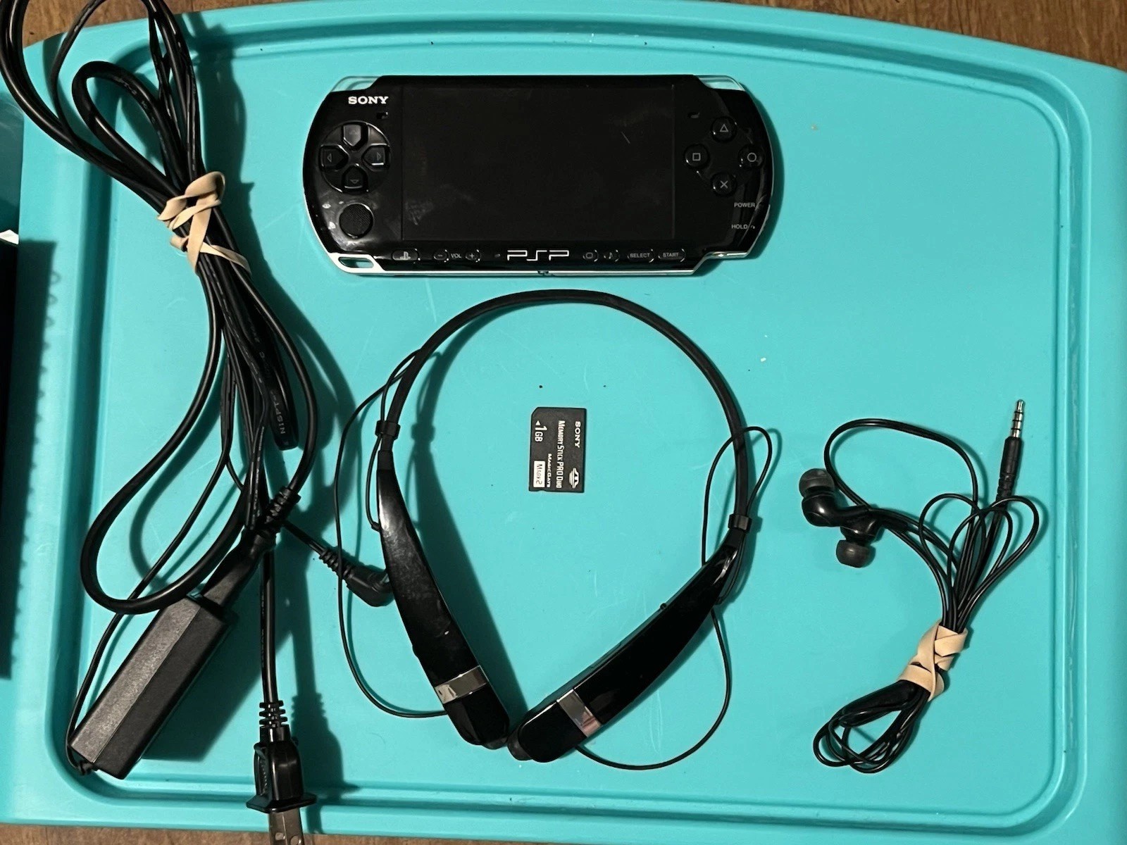 Sony PSP 3001 Black Handheld Console Bundle w/ Charger, Headset, 1GB Stick