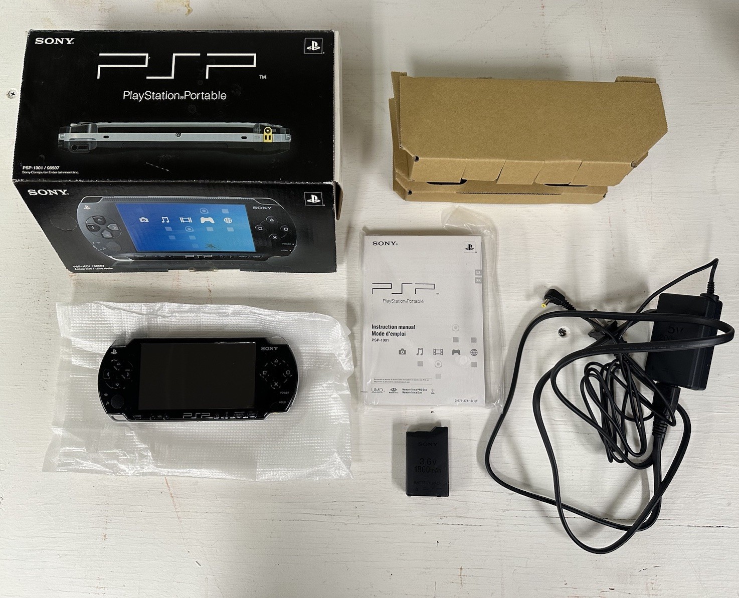 Sony Playstation PSP-2001 Game Console Bundle Repack – Battery Untested, READ