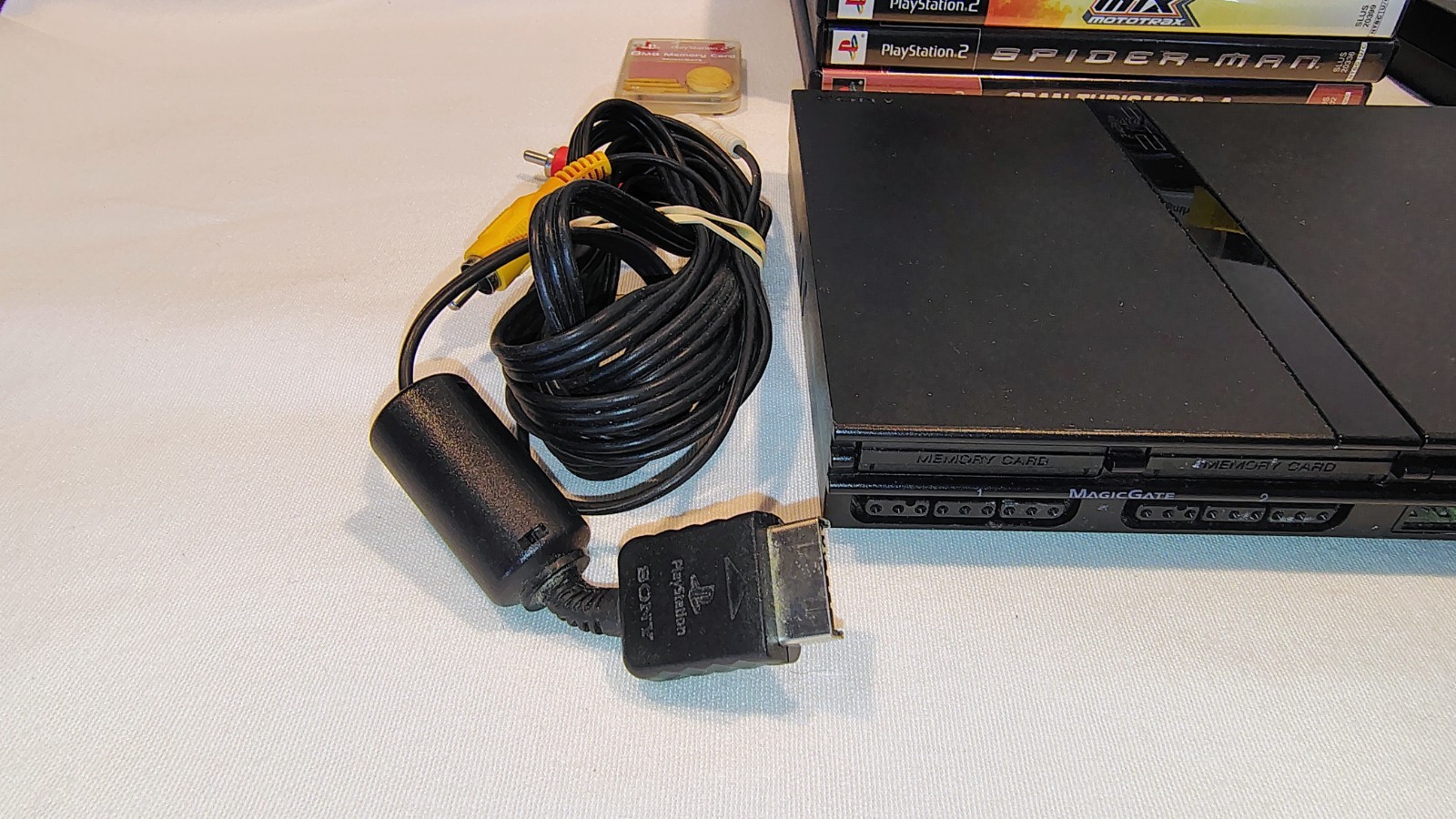PS2 SLIM CONSOLE & ACCESSORIES W/MEMORY CARD/REMOTE & 6 GAMES – KINGDOM HEARTS +