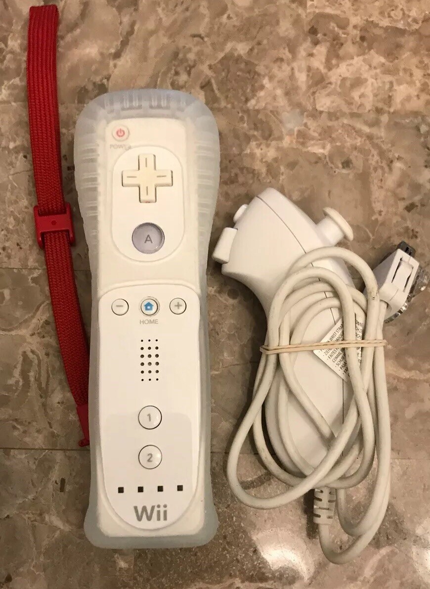 Nintendo Wii White Console System w/ wires, 1 Remote, 3 Games, 1 Link Fight Pad