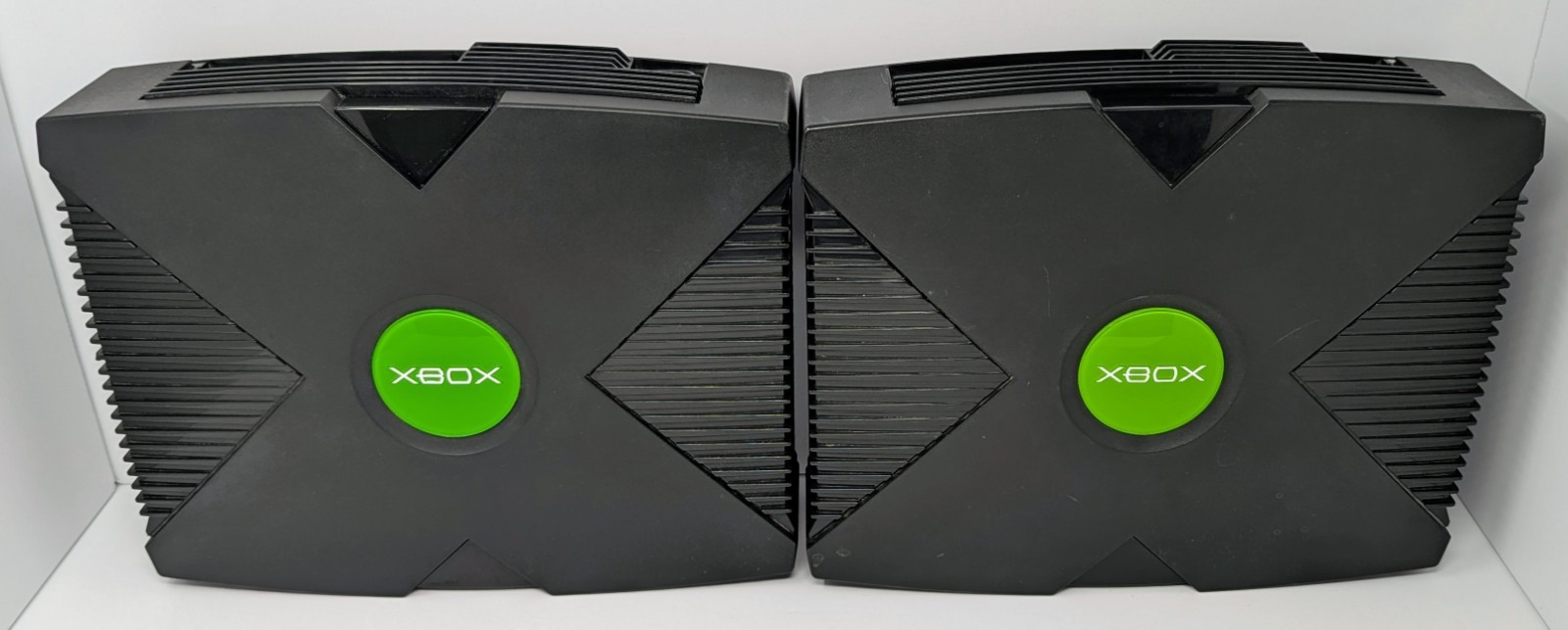 2 Original Microsoft Xbox Consoles – Powers On – For Parts Or Repair