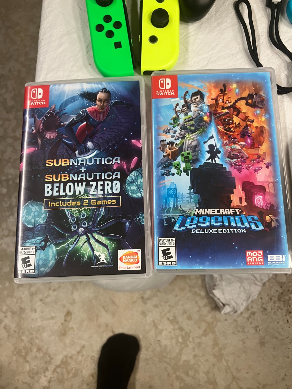 Nintendo Switch 32GB Gray Console with Games, Controllers, and Case Bundle.