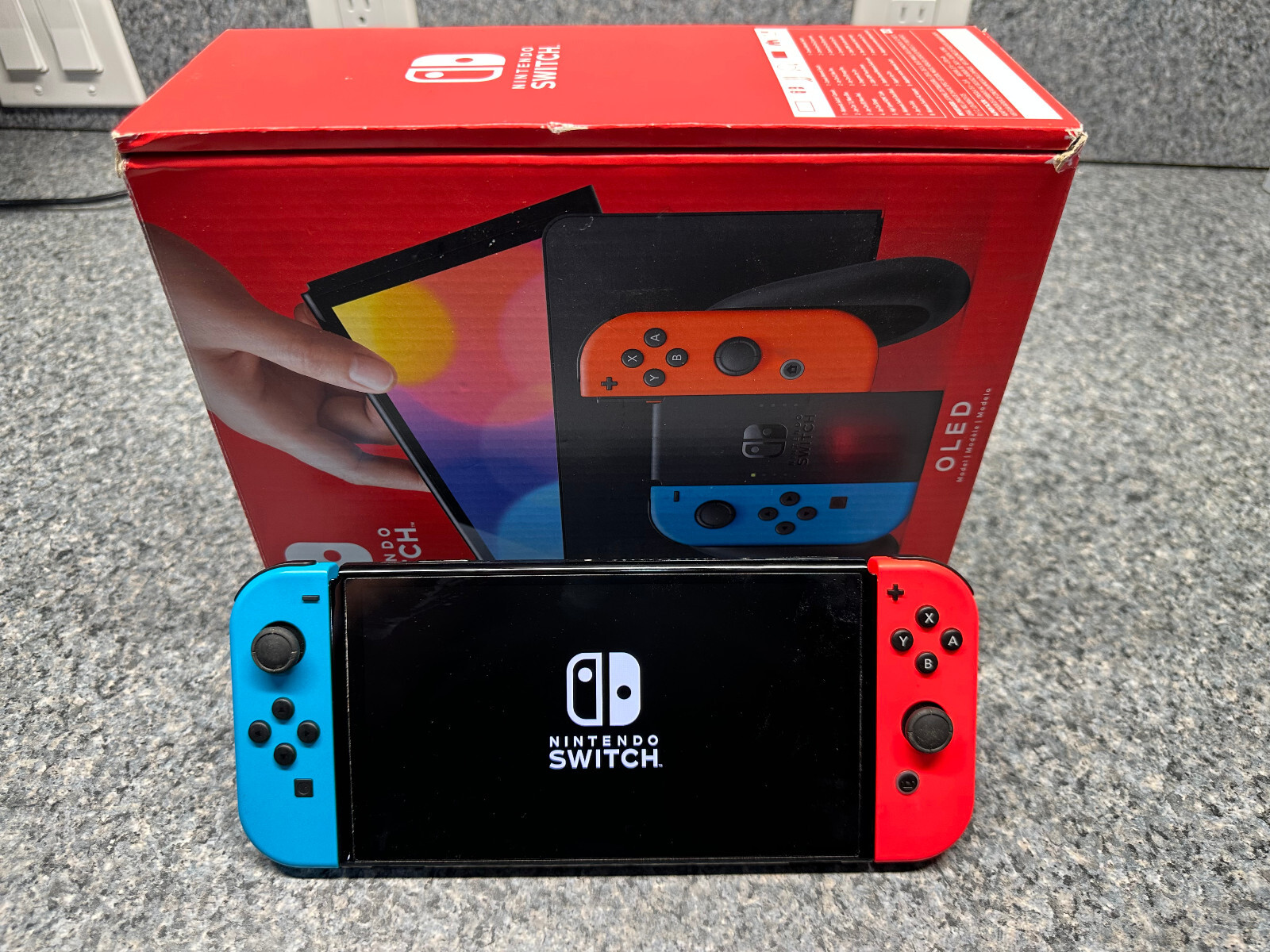 Nintendo Switch OLED Model Handheld Console – 64GB Wifi-HEG-001 w/ R/B Joycons