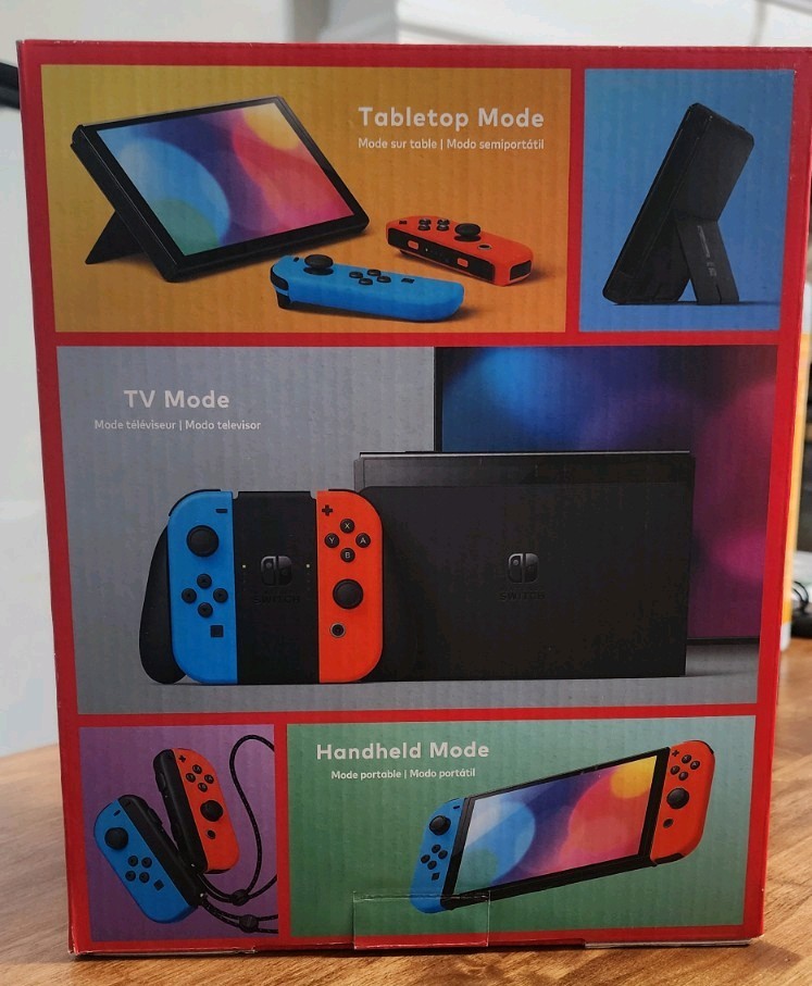 Blue and Red Nintendo Switch OLED – comes wirh 128gb SD card