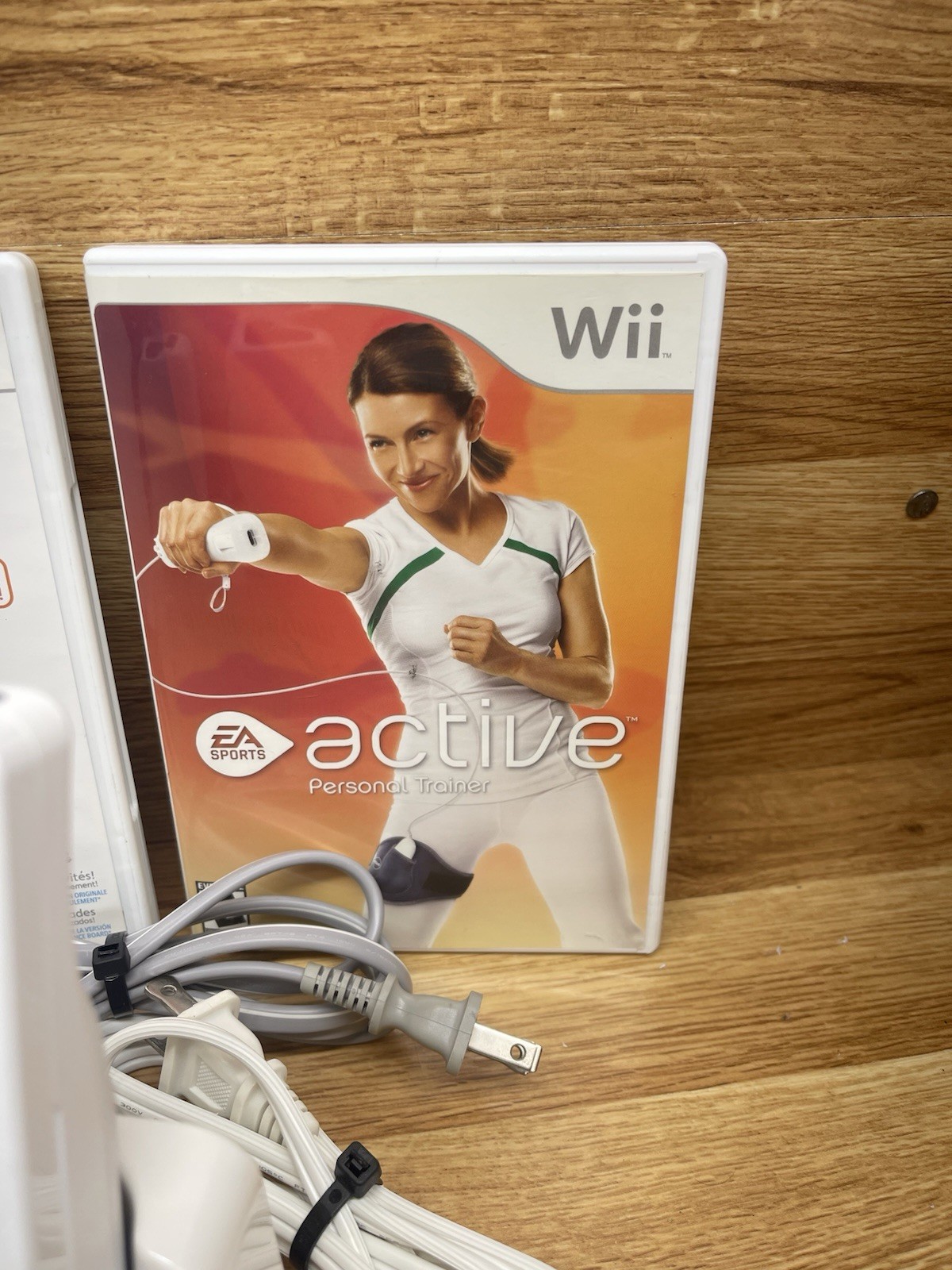 Nintendo Wii Console, Stand, Cords, 2 Controllers, 2 Nunchucks, Manual, 2 Games
