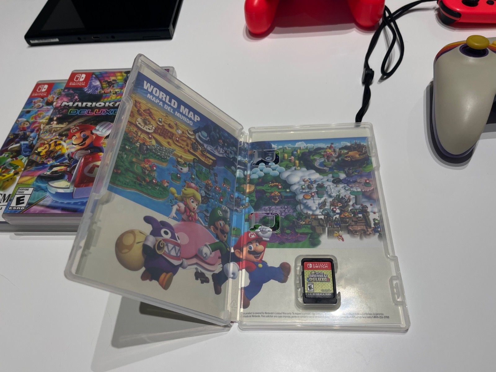 Nintendo Switch Console- All Accessories 5 Controllers + 3 Popular Games