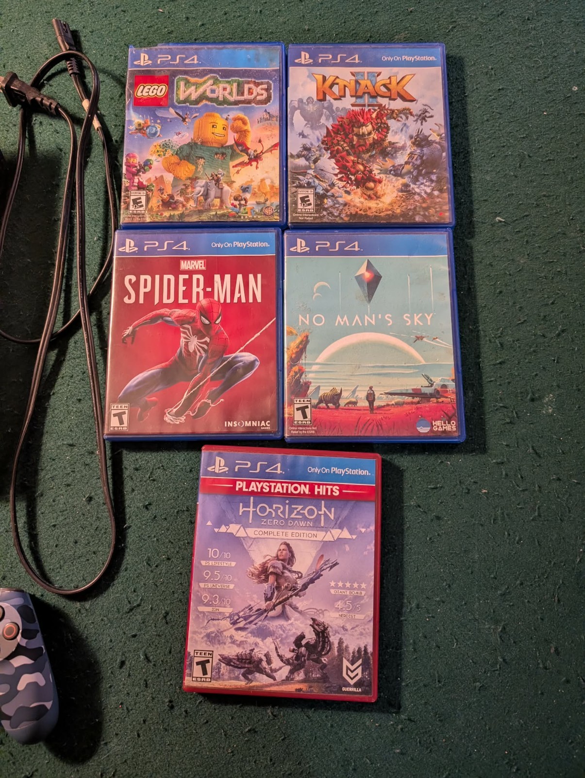 Sony PlayStation 4, game, and controller bundle. 5 games, three controllers.