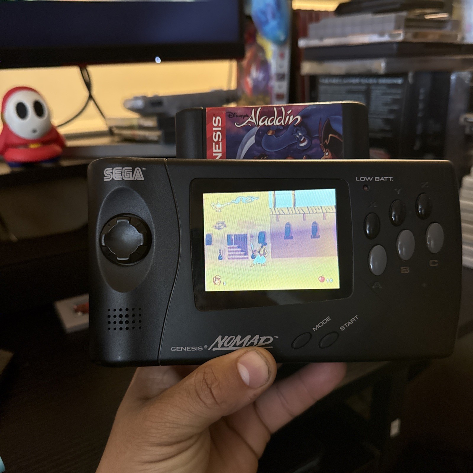 Sega Nomad console with Battery Pack With Aladdin Game