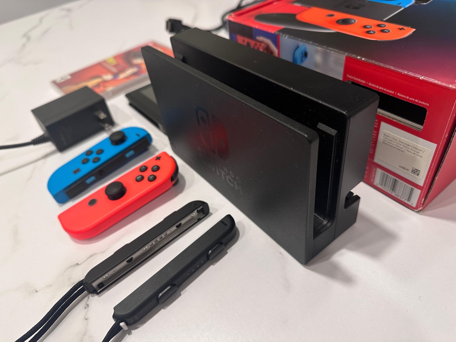 Nintendo Switch 32GB Black Console with Neon Red and Neon Blue Joy-Con