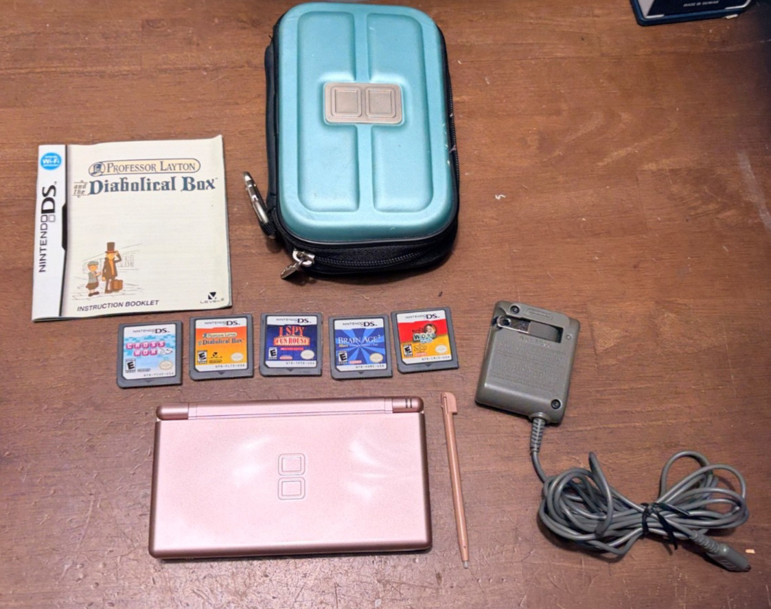 Nintendo DS Lite Metallic Rose handheld console 5 games, stylus, charger & case
