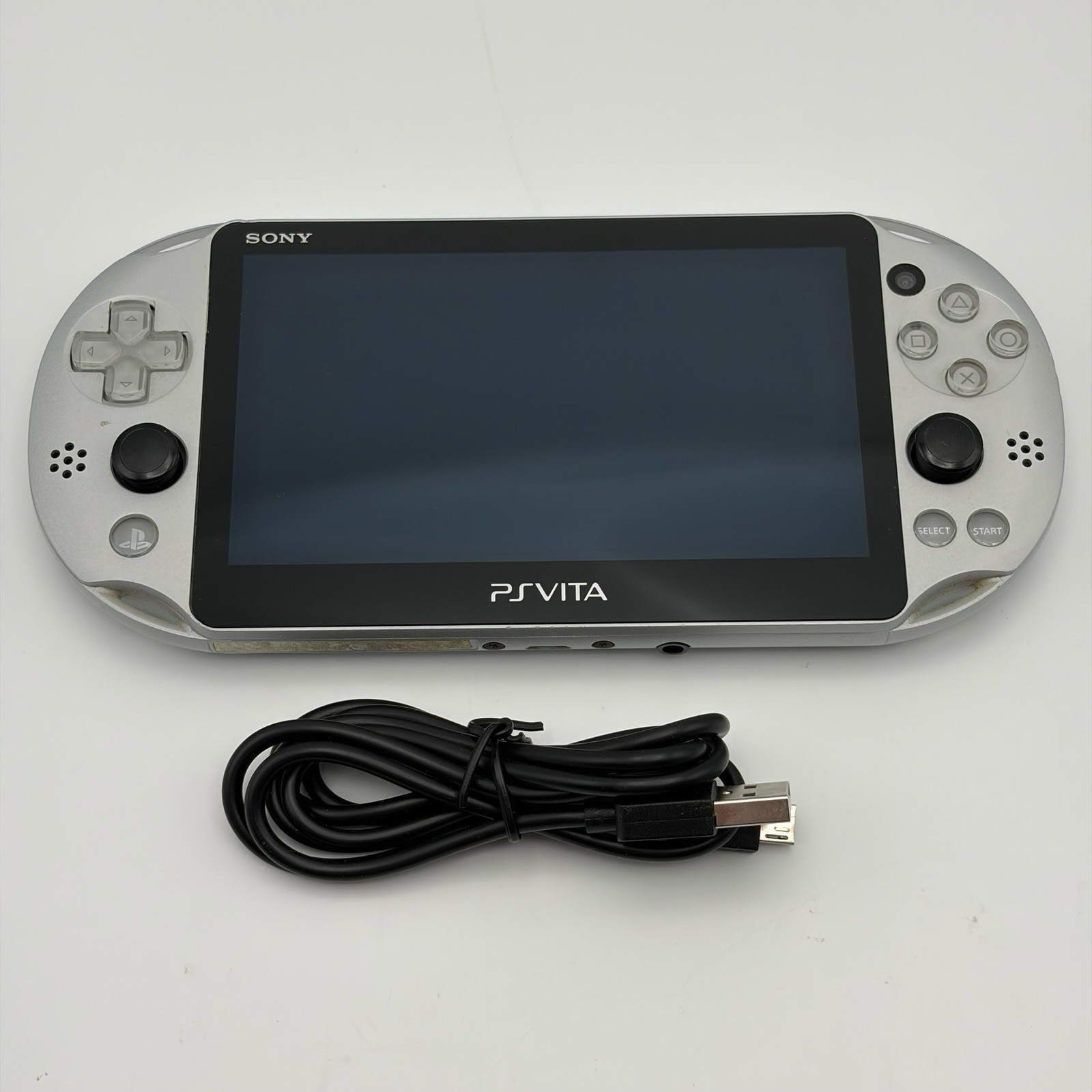 SONY PS Vita PCH-2000 Console Silver Very Good Fast Shipping No joystick drift.