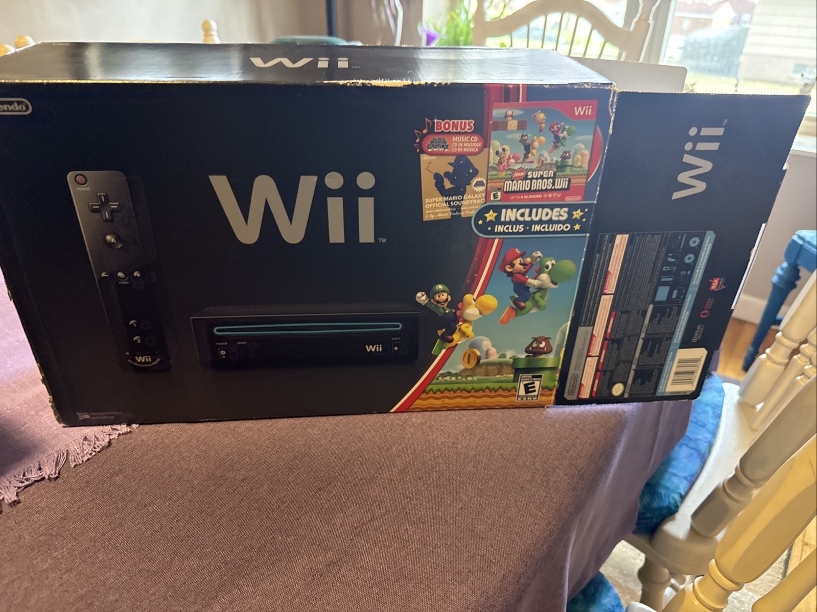 Nintendo Wii mario bundle(no super mario galaxy sound track)(extra remotes)