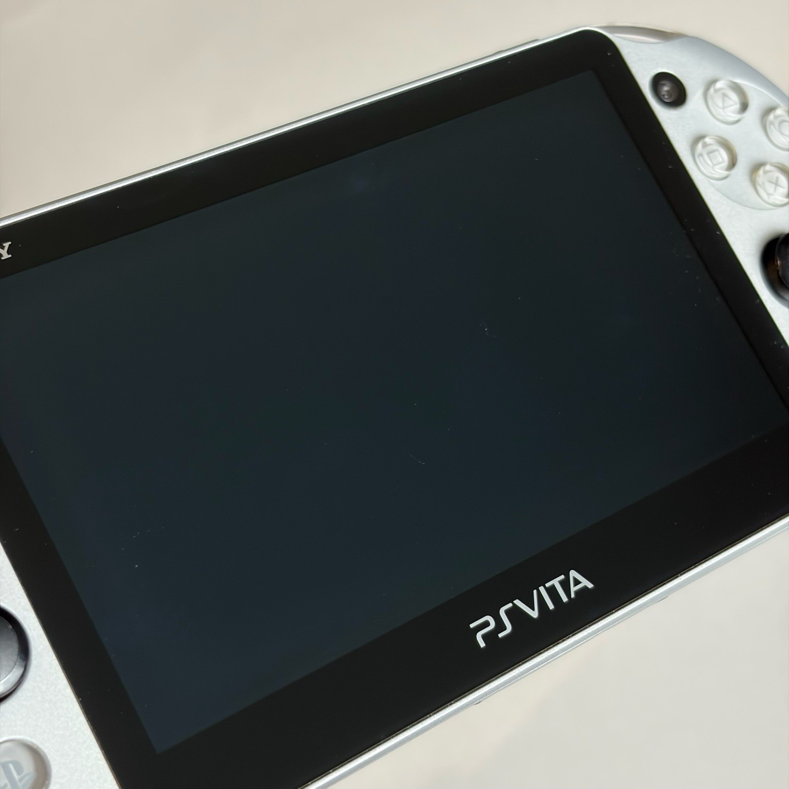 SONY PS Vita PCH-2000 Console Silver Very Good Fast Shipping No joystick drift.