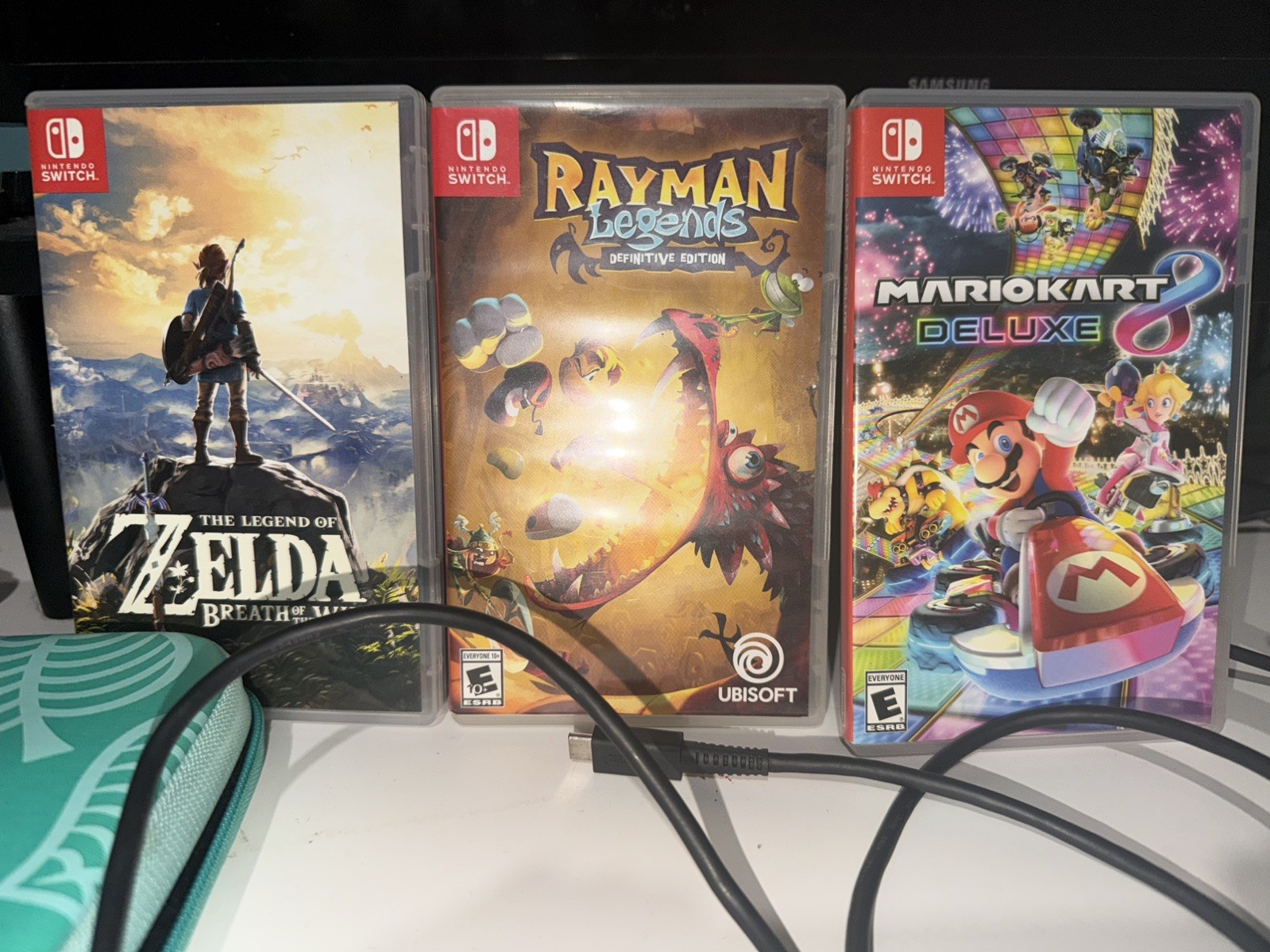 Nintendo Switch With Black JoyCons W/ Charging Dock and games/spare controllers