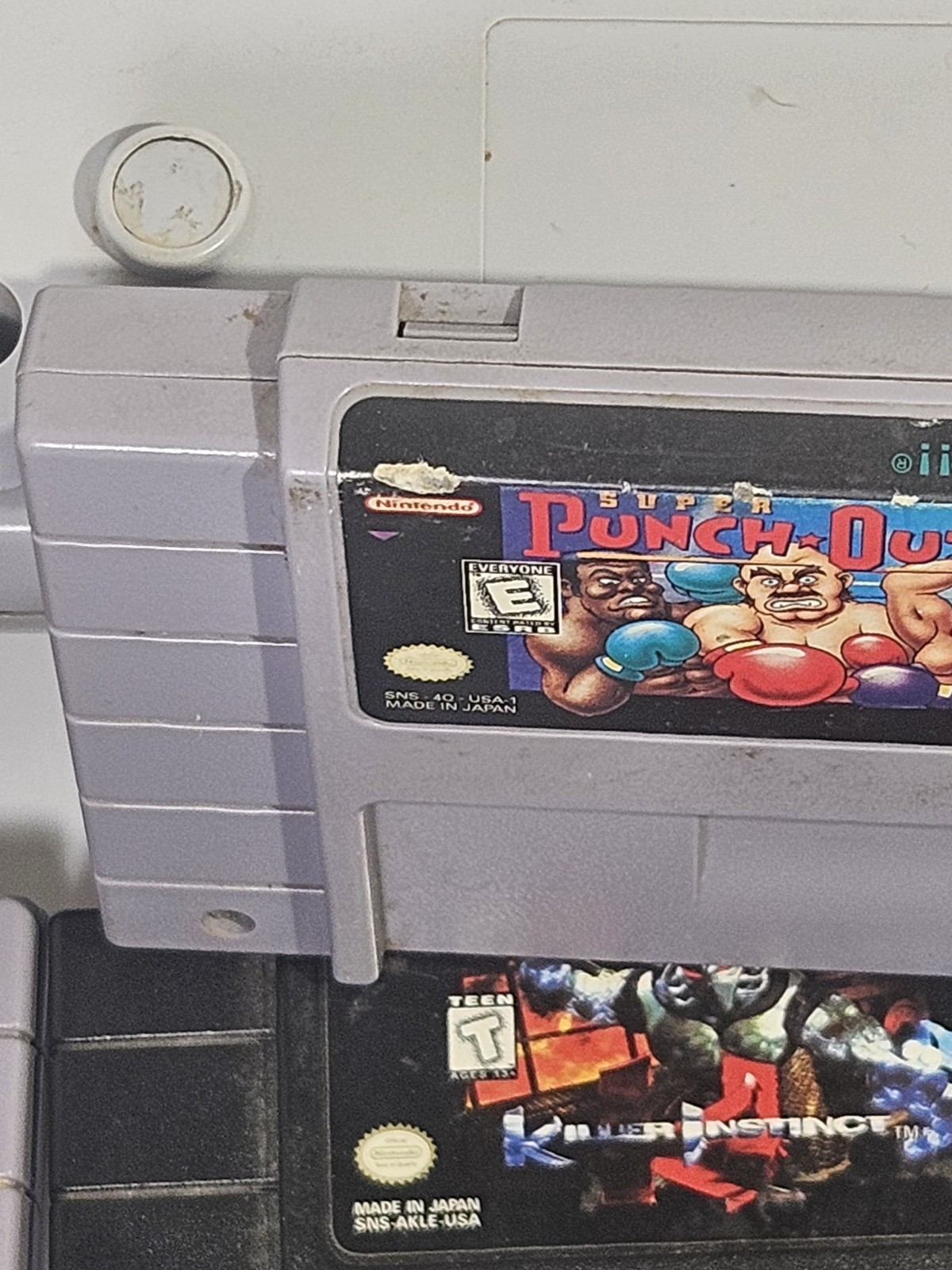 Super Nintendo SNES JR Console with 8 games, cords, and 1 controller