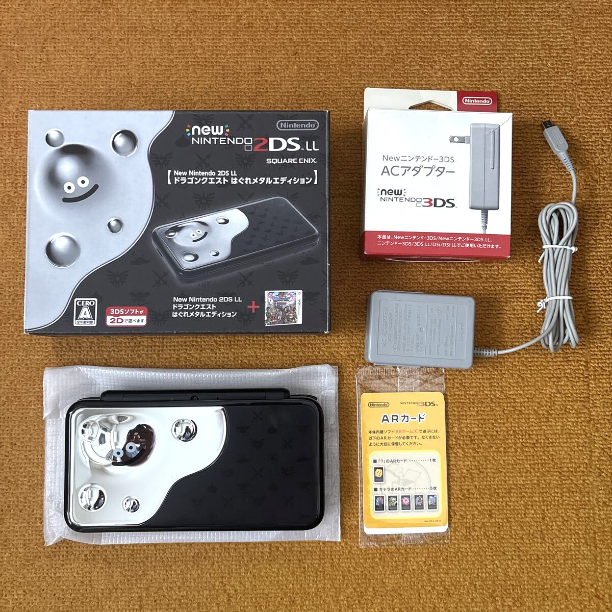 New Nintendo 2DS XL Dragon Quest Hagure Metal w/ Box, Charger No Software Rank:A
