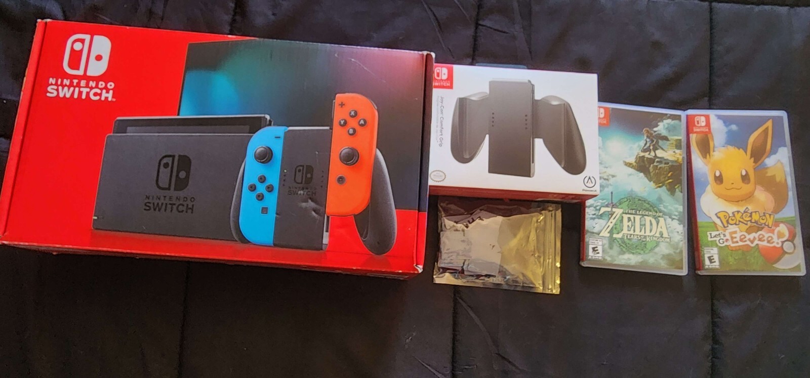 Nintendo Switch In Box – With Tears of the Kingdom and Pokemon: Lets GO Eevee