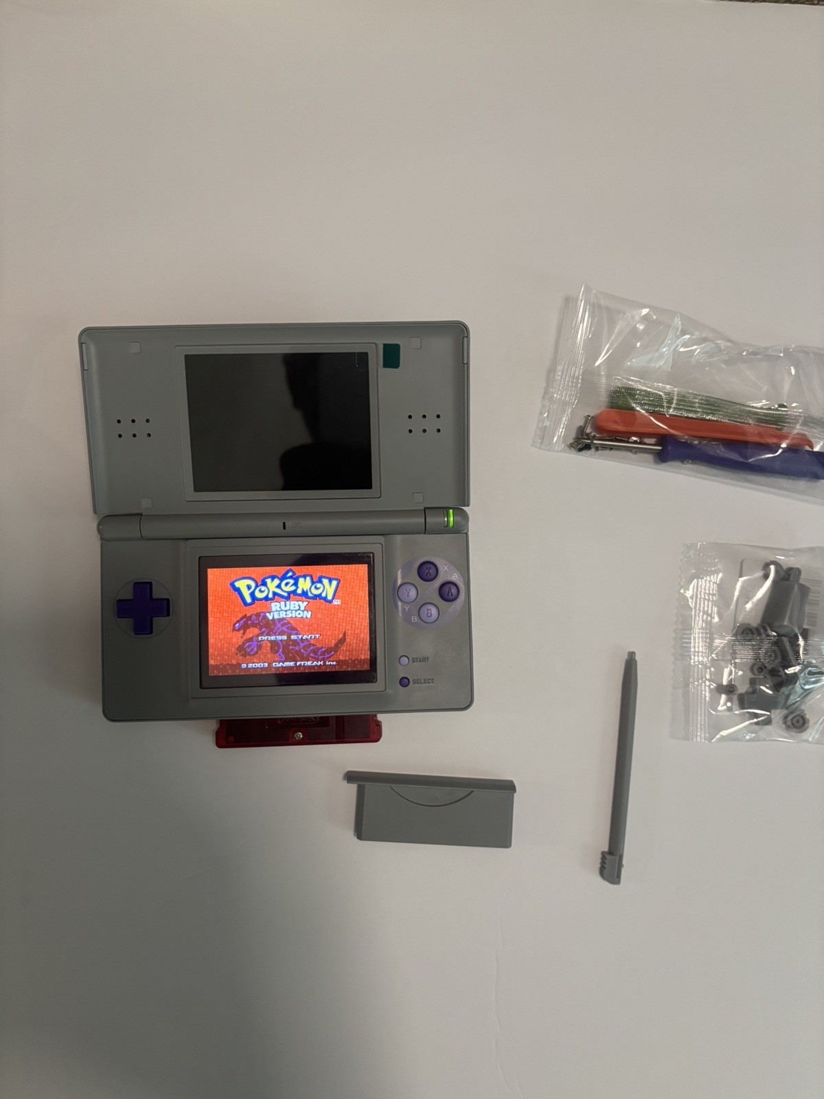 Nintendo ds Lite SNES Reshell With Charger, Ruby and screwdriver/buttons