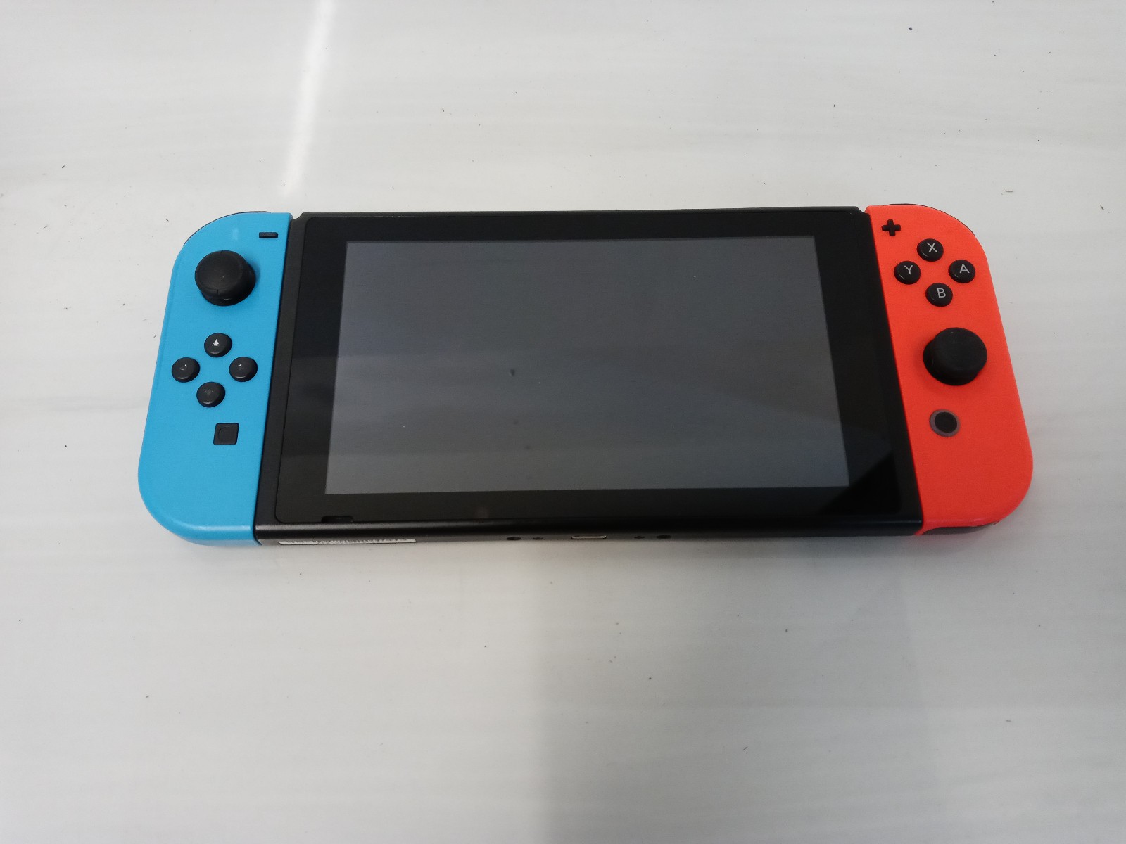Nintendo Switch 32GB Game Console Only with Neon Blue / Red Joy-Con, (HAC-001)