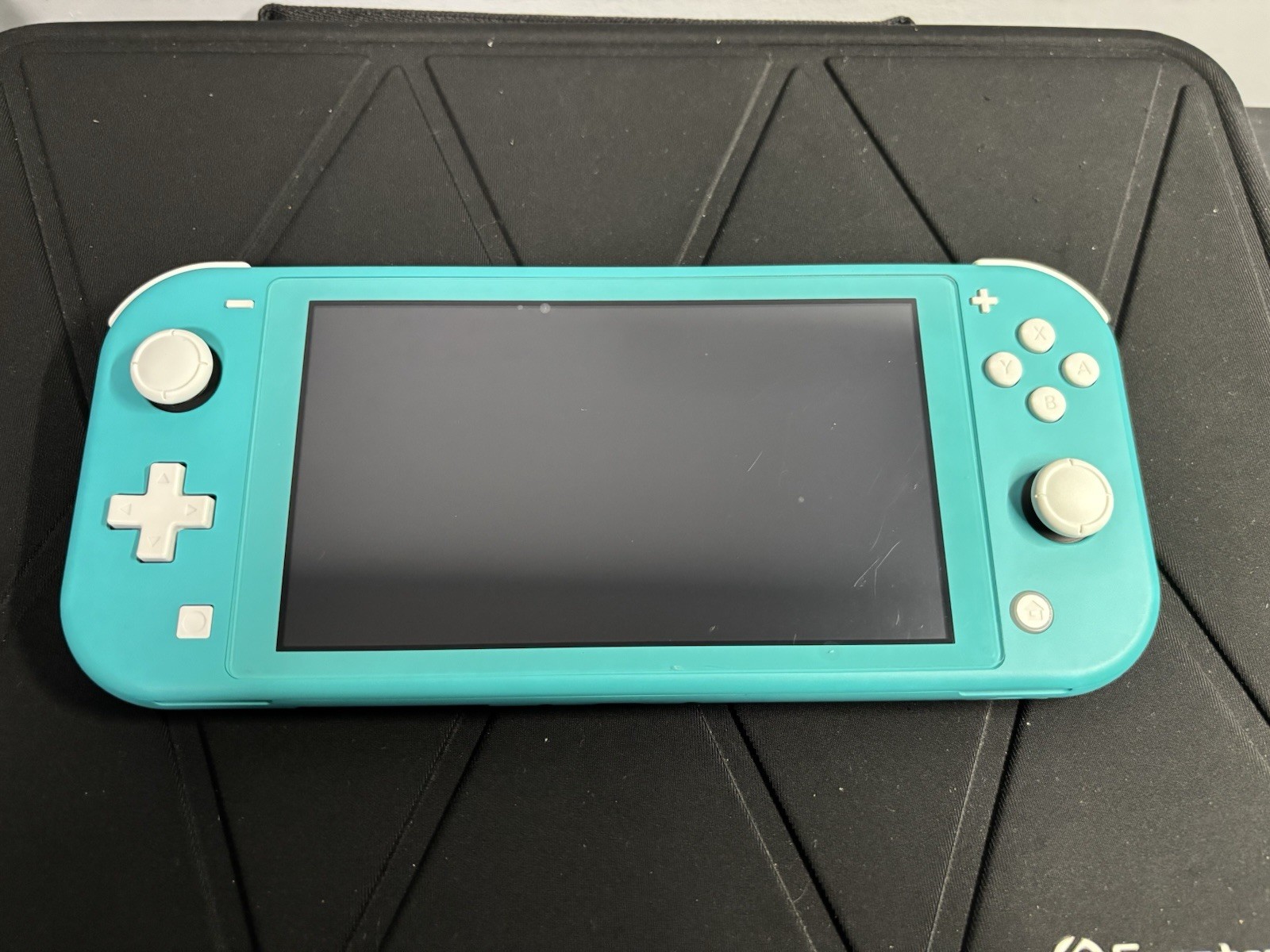 Nintendo Switch Lite Turquoise Used w/ Case, Protection grip and Mario Aces