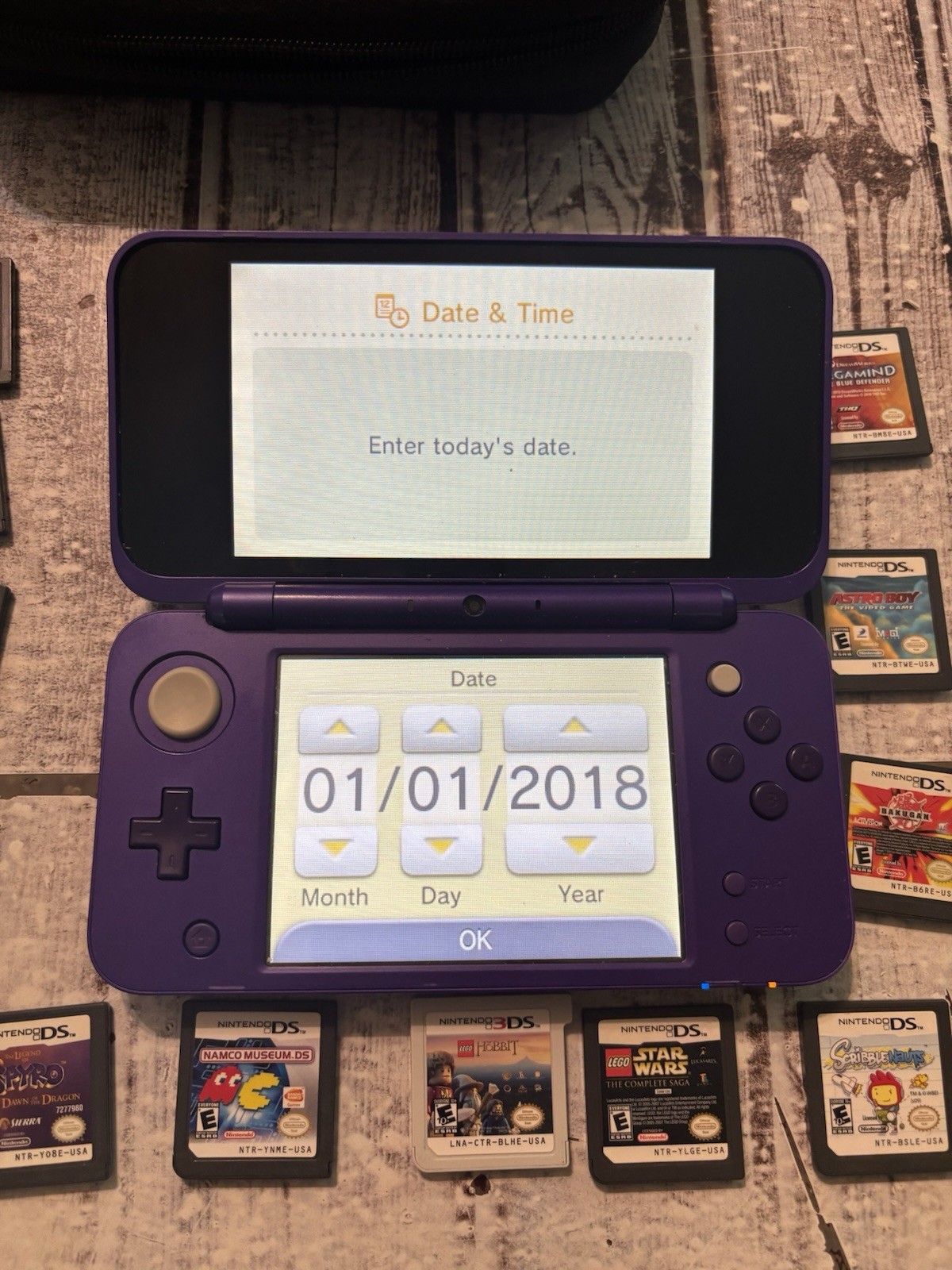 Nintendo “New” 2DS XL Handheld Console (JAN-001) Purple w/Charger + 16 GAMES