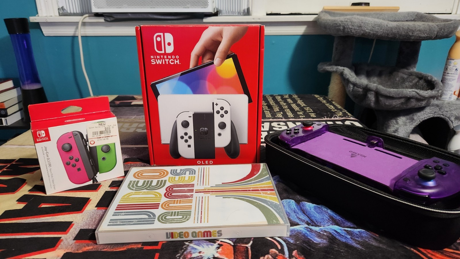 NINTENDO SWITCH OLED BUNDLE- PINK/GREEN JOYCON, 256G SD, NEIXGO GRIP/DOCK & CASE