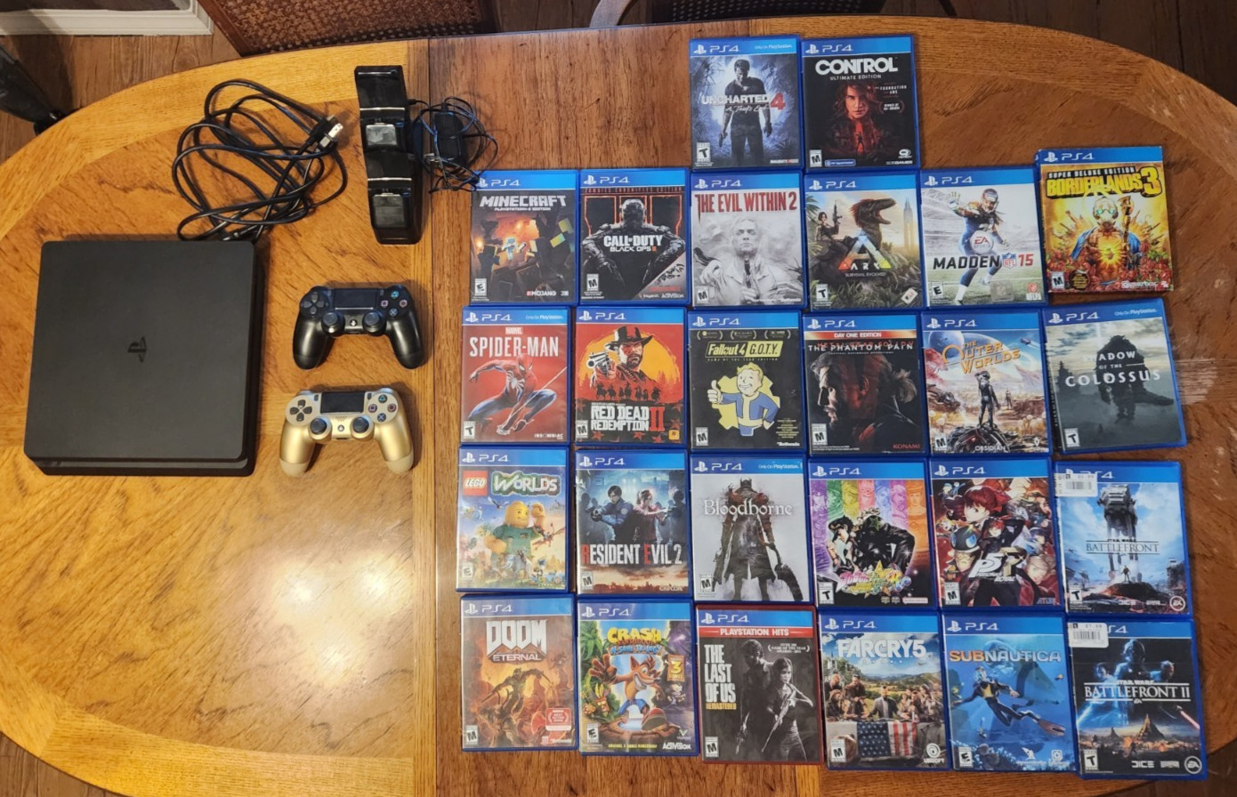 PS4 Slim Bundle, 2 Sony Controllers, 26 Games- RDR2 Spider-Man Persona 5 + More