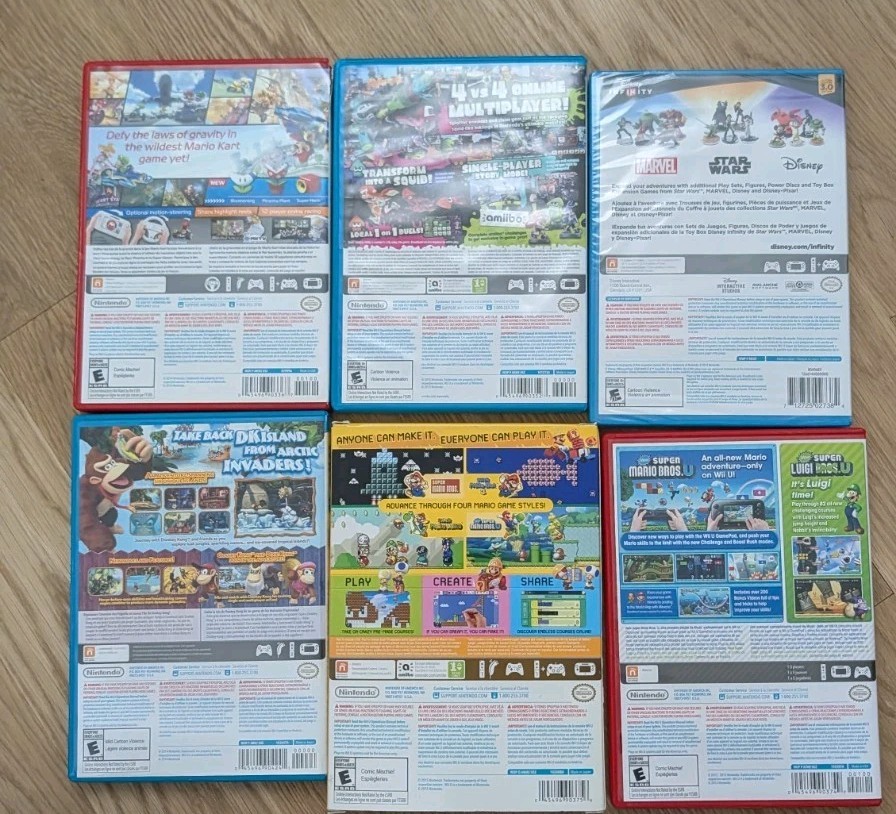 Nintendo Wii U Mario Kart 8 Deluxe 32GB Handheld System – Black + Games