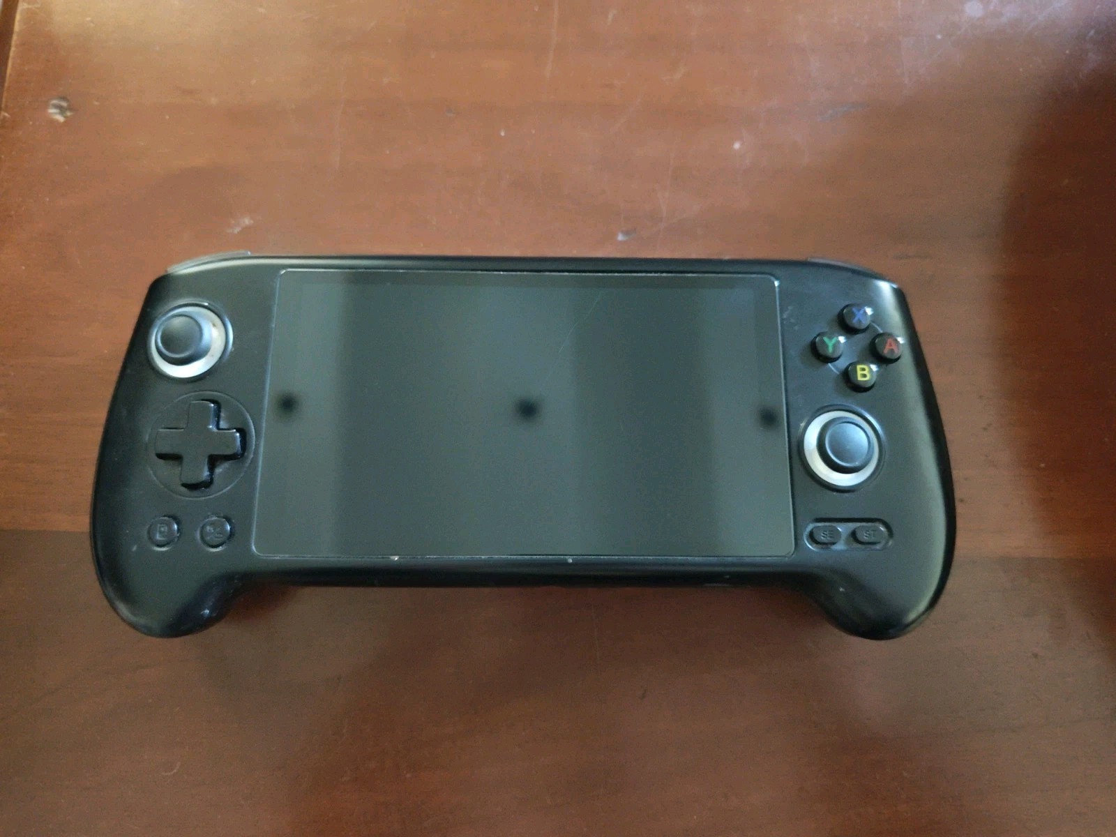 ANBERNIC RG556 Game Console 5.48′ AMOLED Screen Android 13