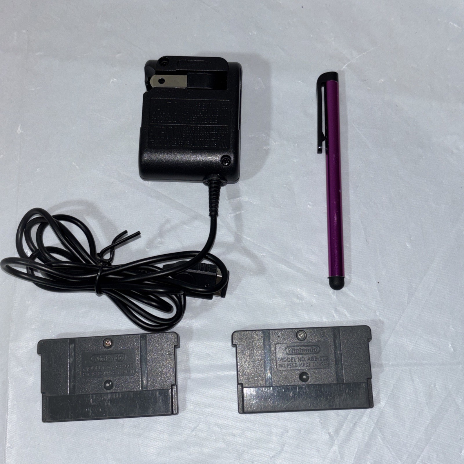 Nintendo DS Silver Handheld System with Wrist Strap + 6 Games Tested and Working