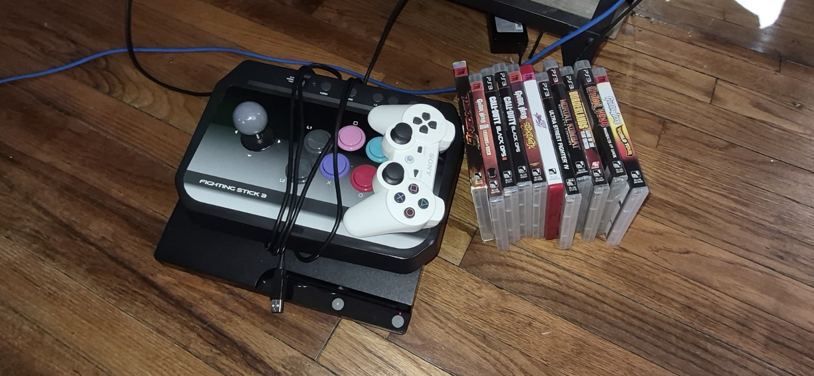 Sony PlayStation 3 Slim Console with Controller, Power Cords, and Games