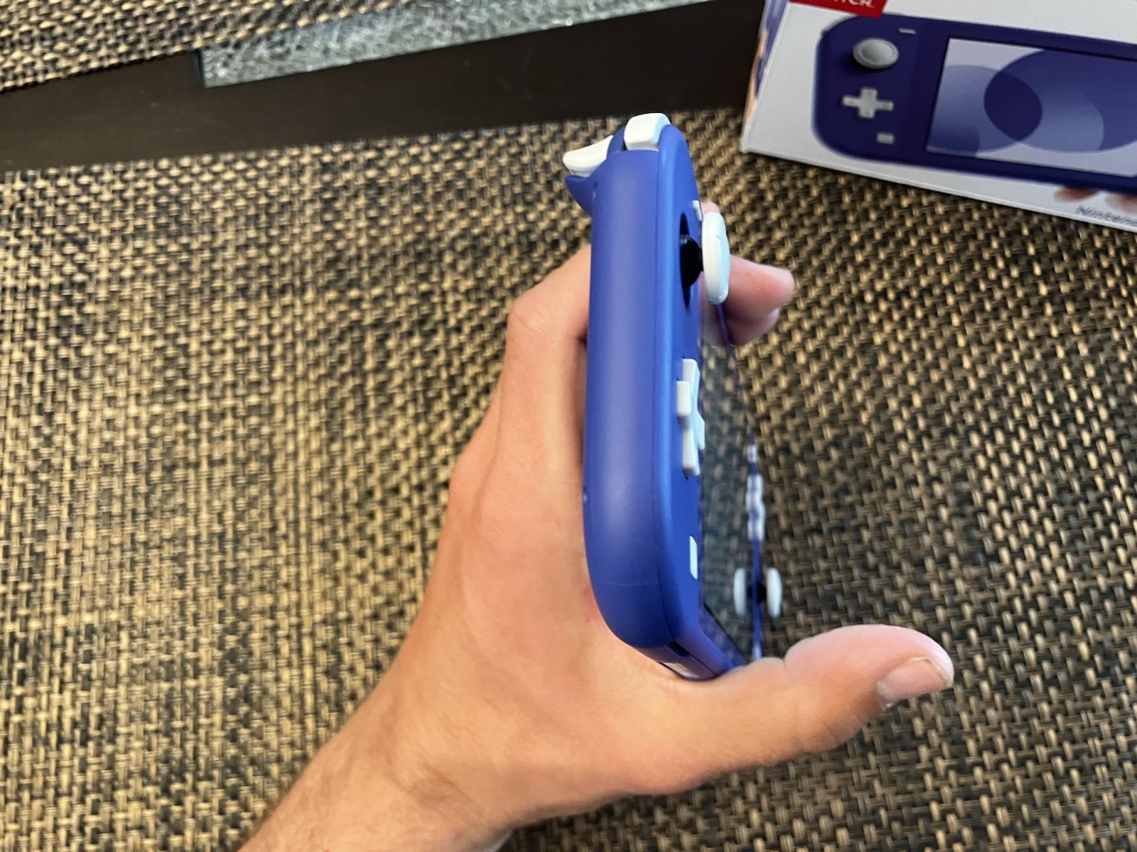 Used Switch Lite in Purple