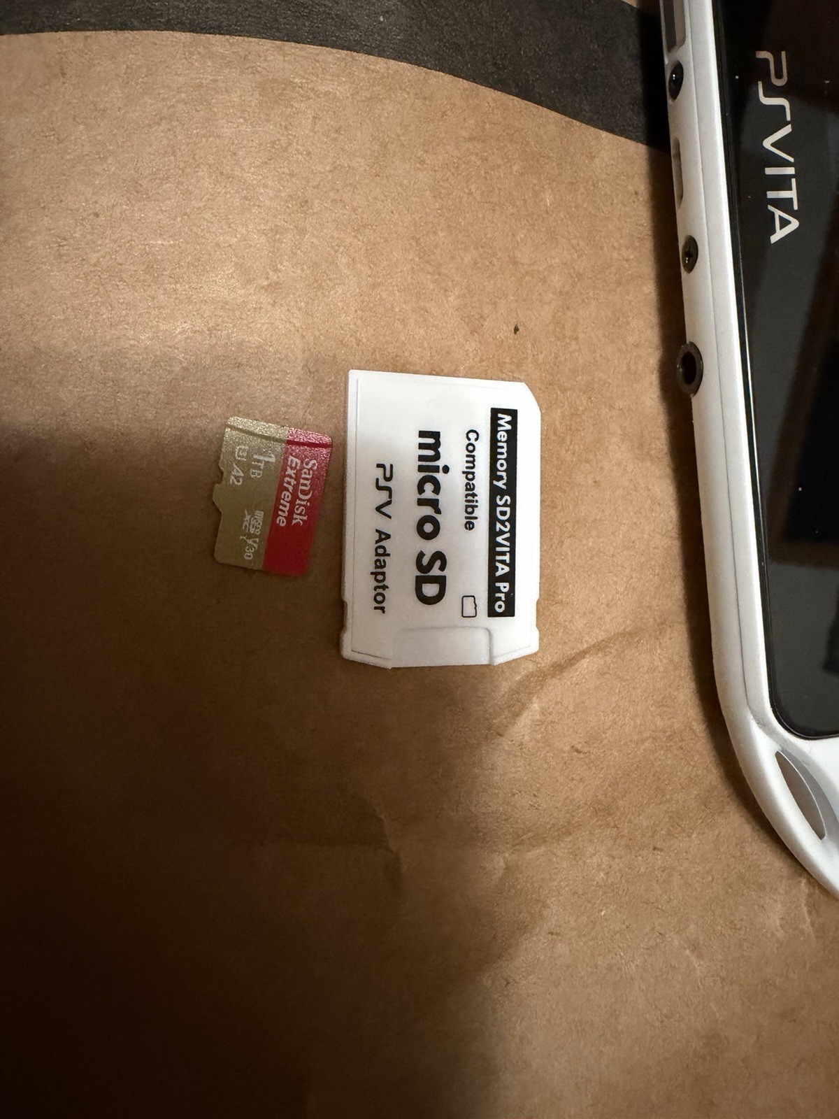 PS Vita PCH-2000 Slim Black and White with Charger Tested Working