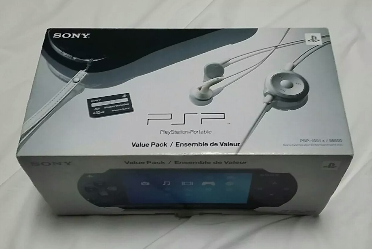 Sony PSP-1001bundle (5movies+2multiple games) w/accesories+PS2 Light Blue Stand.
