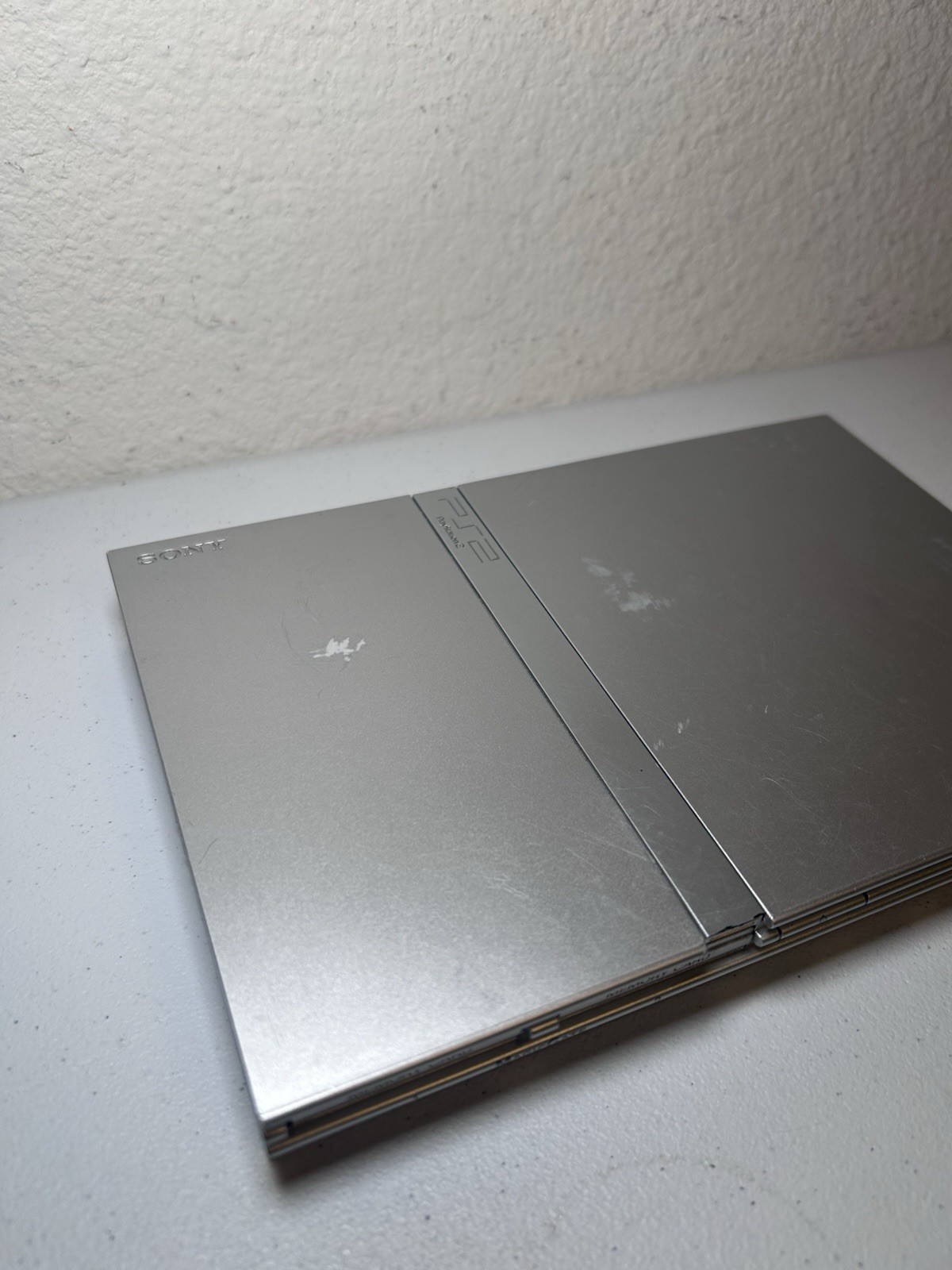 Sony PlayStation 2 Slim Silver (SCPH-77001) Bundle With Controller And Cords