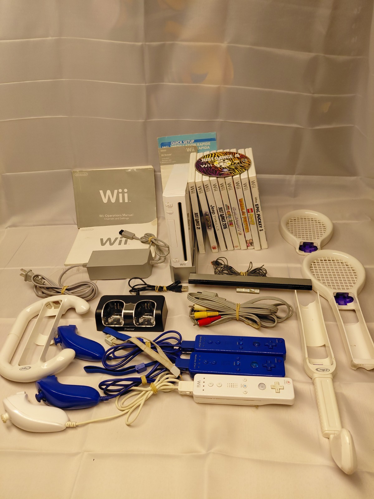 Nintendo Wii Bundle – Power, A/V Cables, & Sensor – 10 Games & Accesories