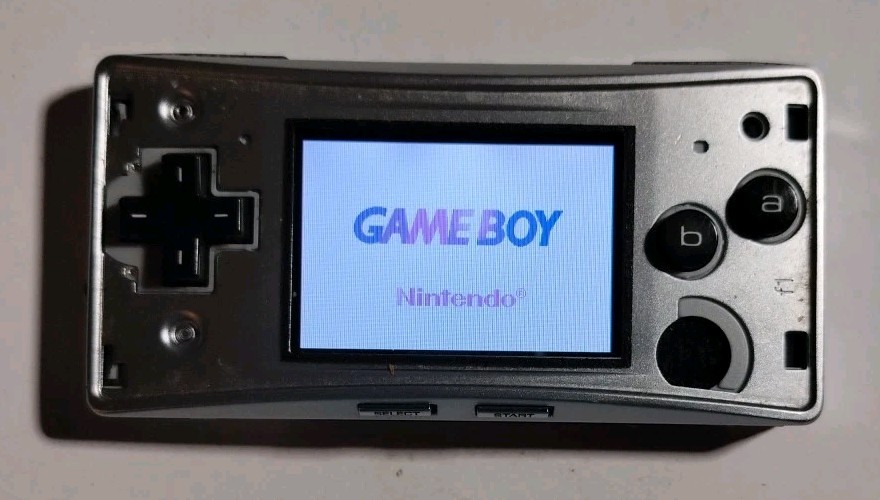 Nintendo Game Boy Micro GBA (Working) with Cracked Faceplate & 3rd-Party Charger