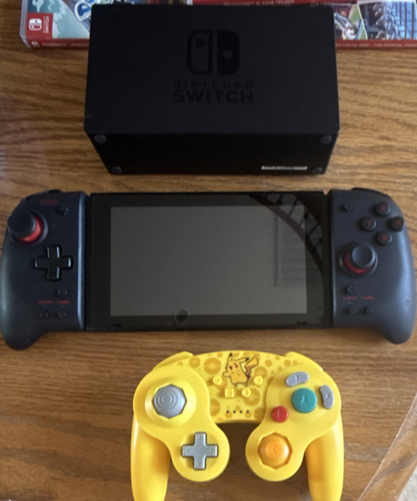 Nintendo Switch Console Black with Dock, Controllers, Pikachu Yellow Controller