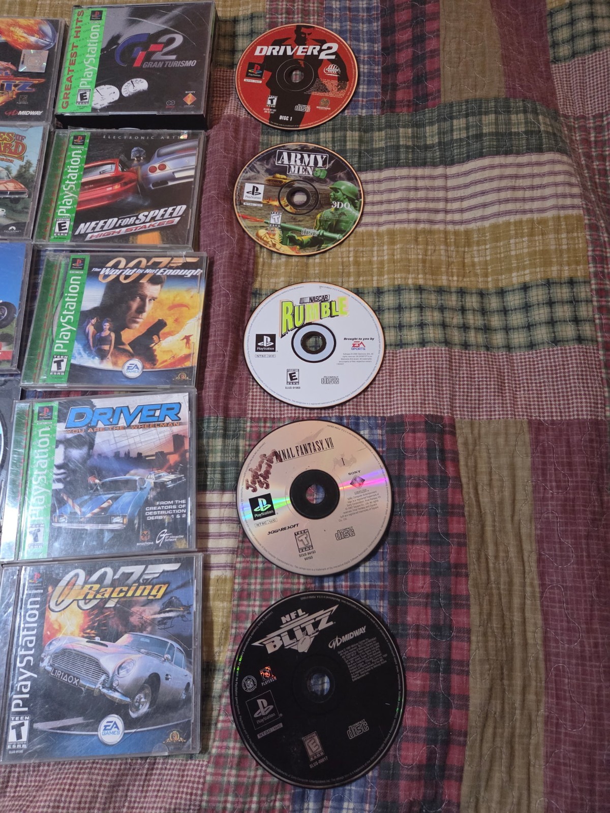 PlayStation 1 with various games tested in working condition has 2 controllers