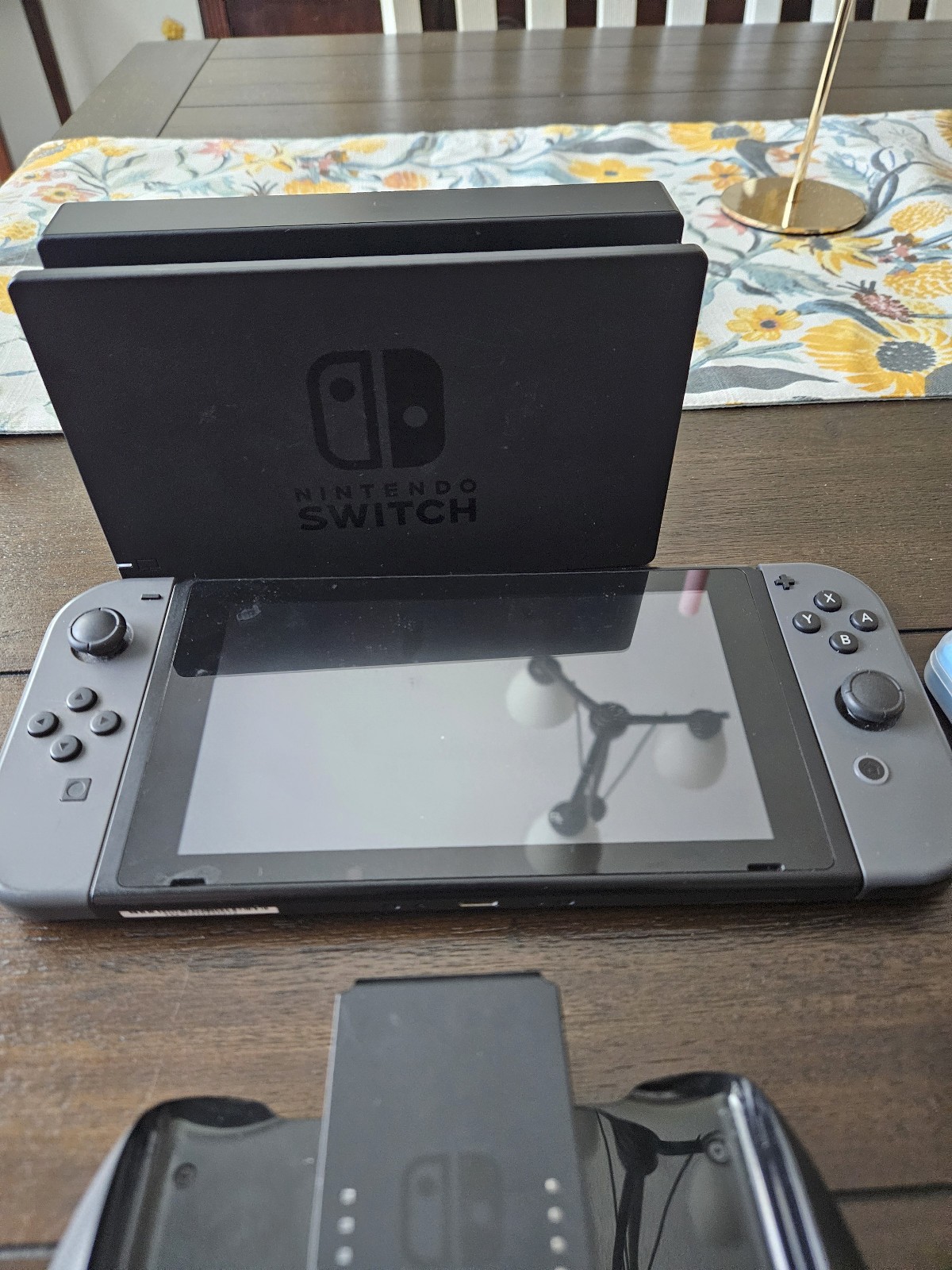 Nintendo Switch with Joycons, 256 micro SD, HDMI Cable, Dock, and power cable.