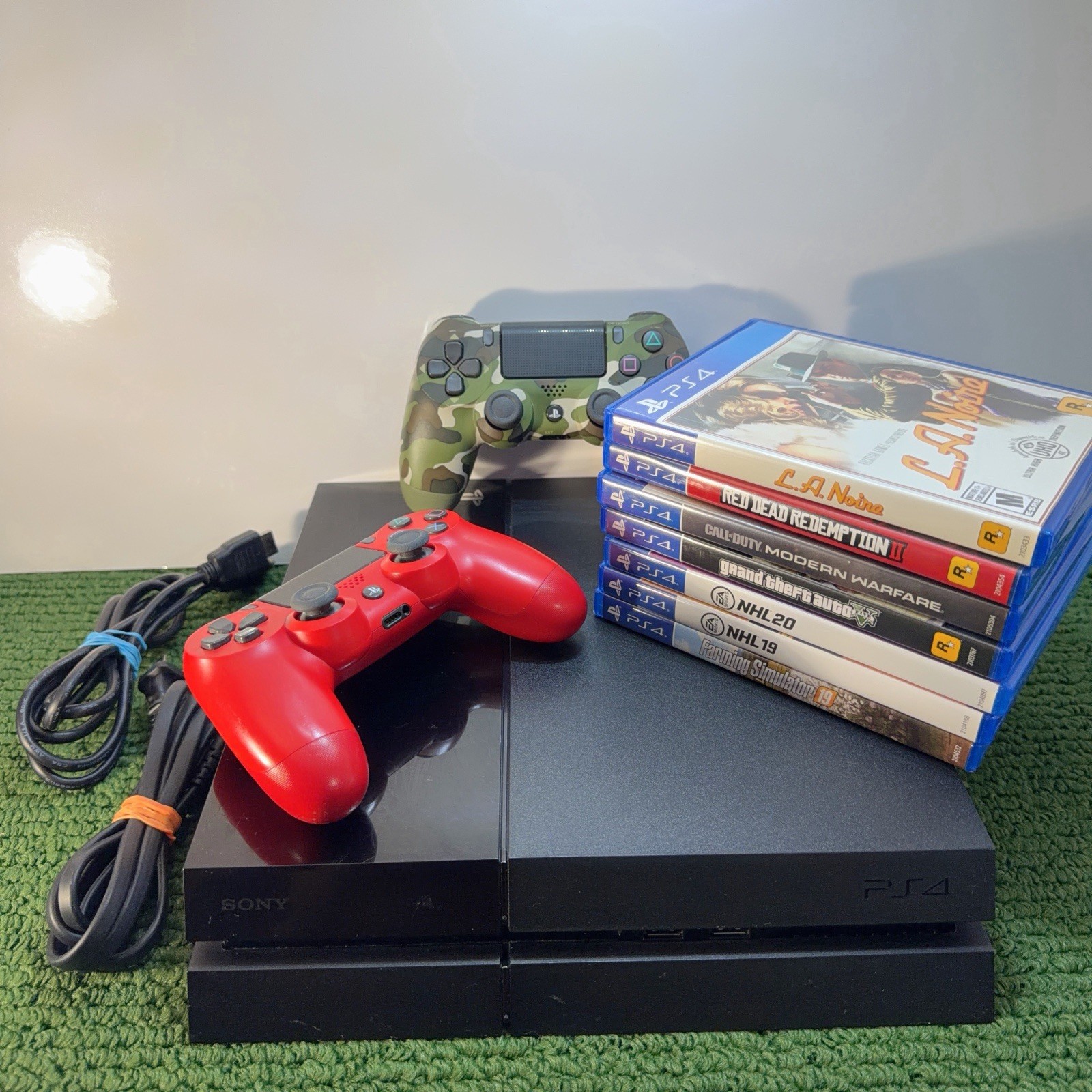 Sony PS4 (CUH-1001A) Black 500GB Console + 7 Games And 2 Controller