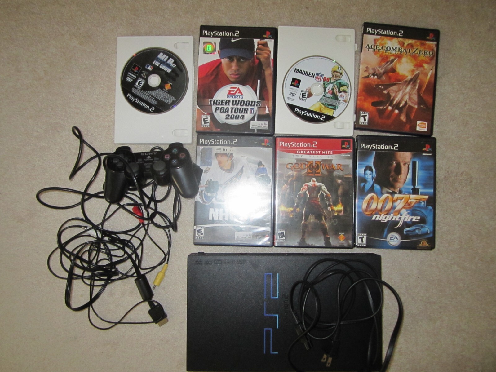 Sony PS2 Game System Bundle w/ contoller 7 Games 2 Memory Cards