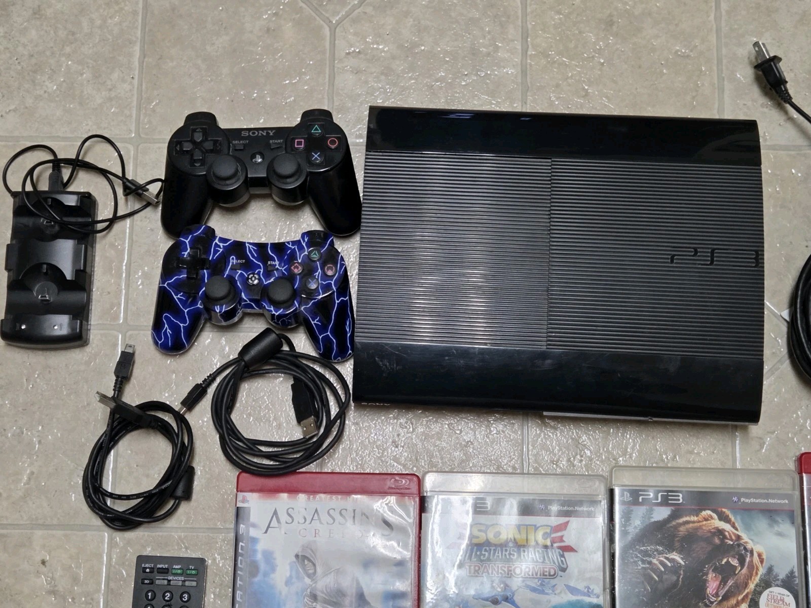 Sony PlayStation 3 PS3 Console Super Slim 250GB + 2 controllers, 9 Game -Bundle