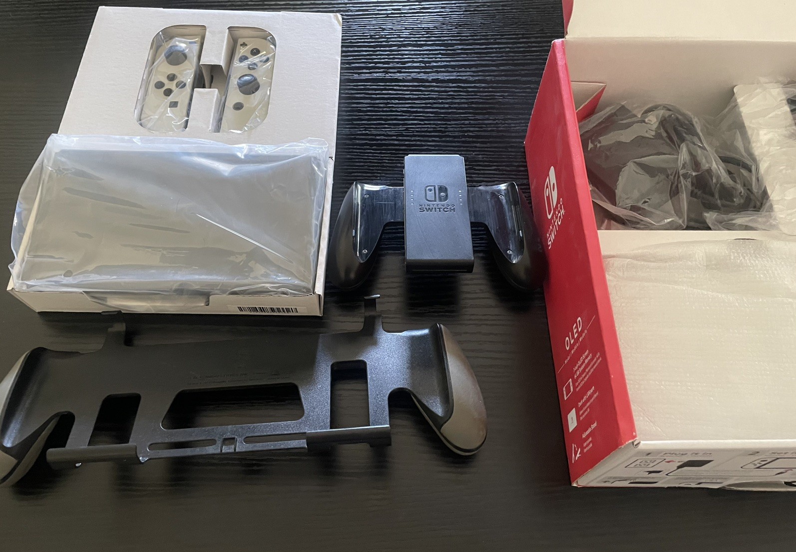 Nintendo Switch OLED with 128GB Micro SD Card, Original Box, & Handheld Grip