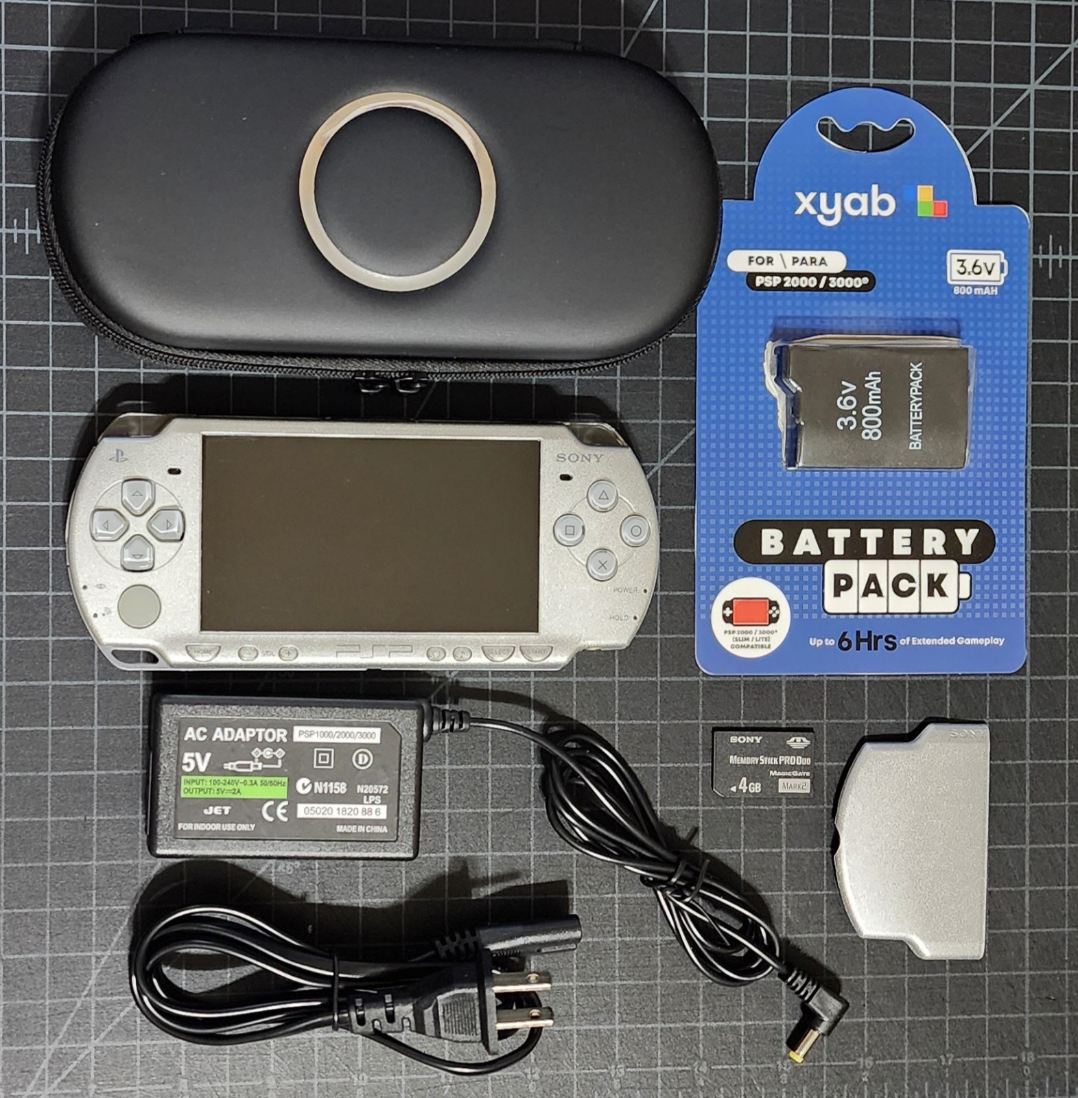 Sony PSP 2000 Console Ice Silver Good Condition + 4GB Card, Charger & Case T&W