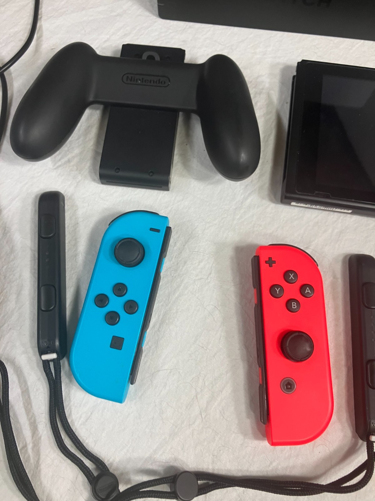 Nintendo Switch 32GB Gray Console with Games, Controllers, and Case Bundle.