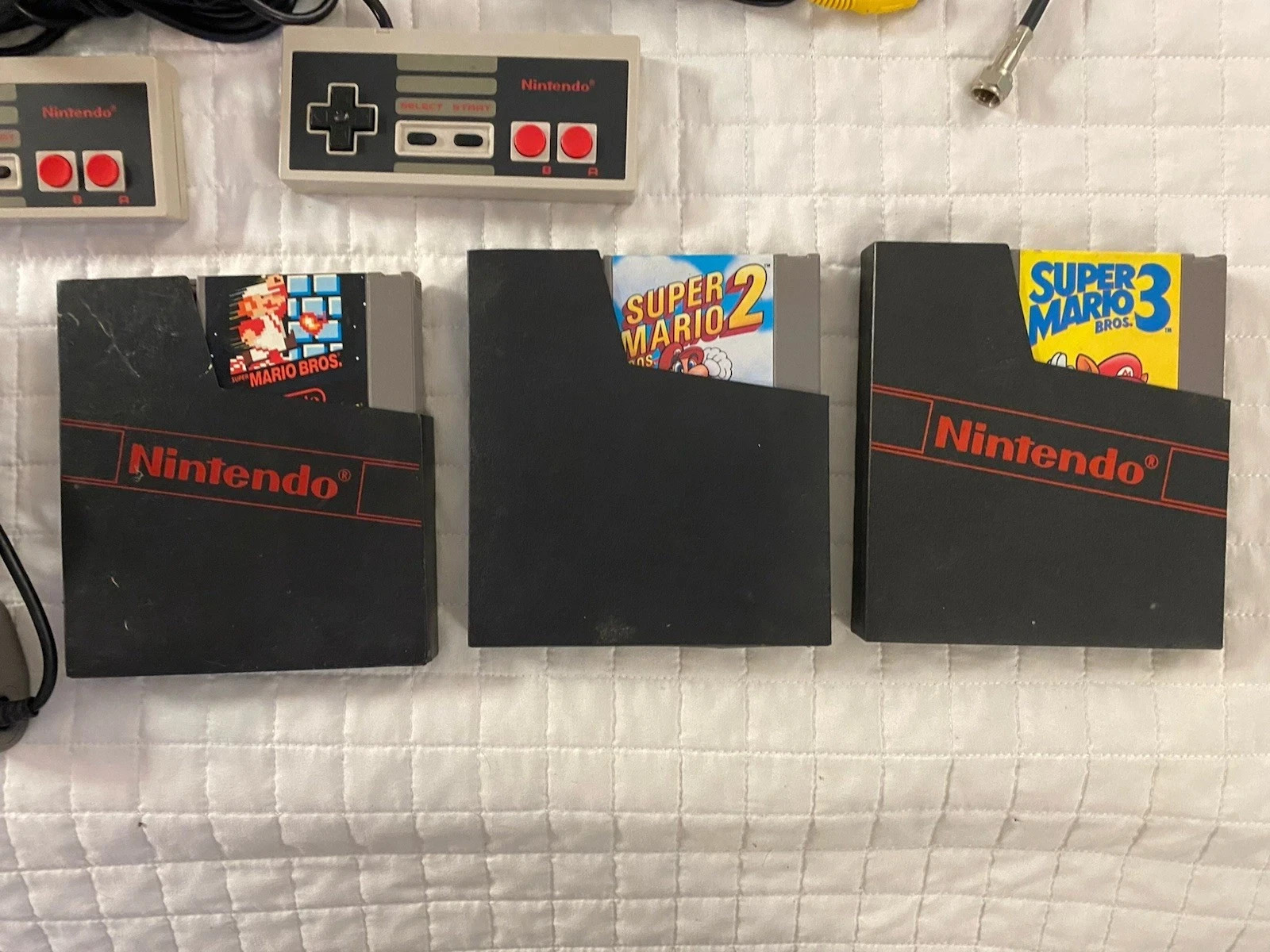 authentic NES Console Bundle with Super Mario Bros. 1,2,3 and 2 Controllers gun