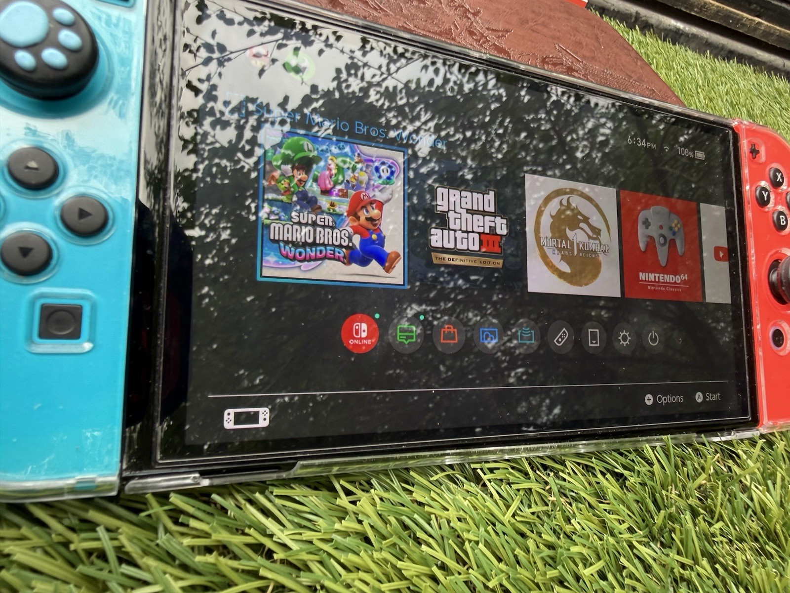 Nintendo Switch OLED Bundle – Zelda Case, SD Card, Grip, Controller Grip